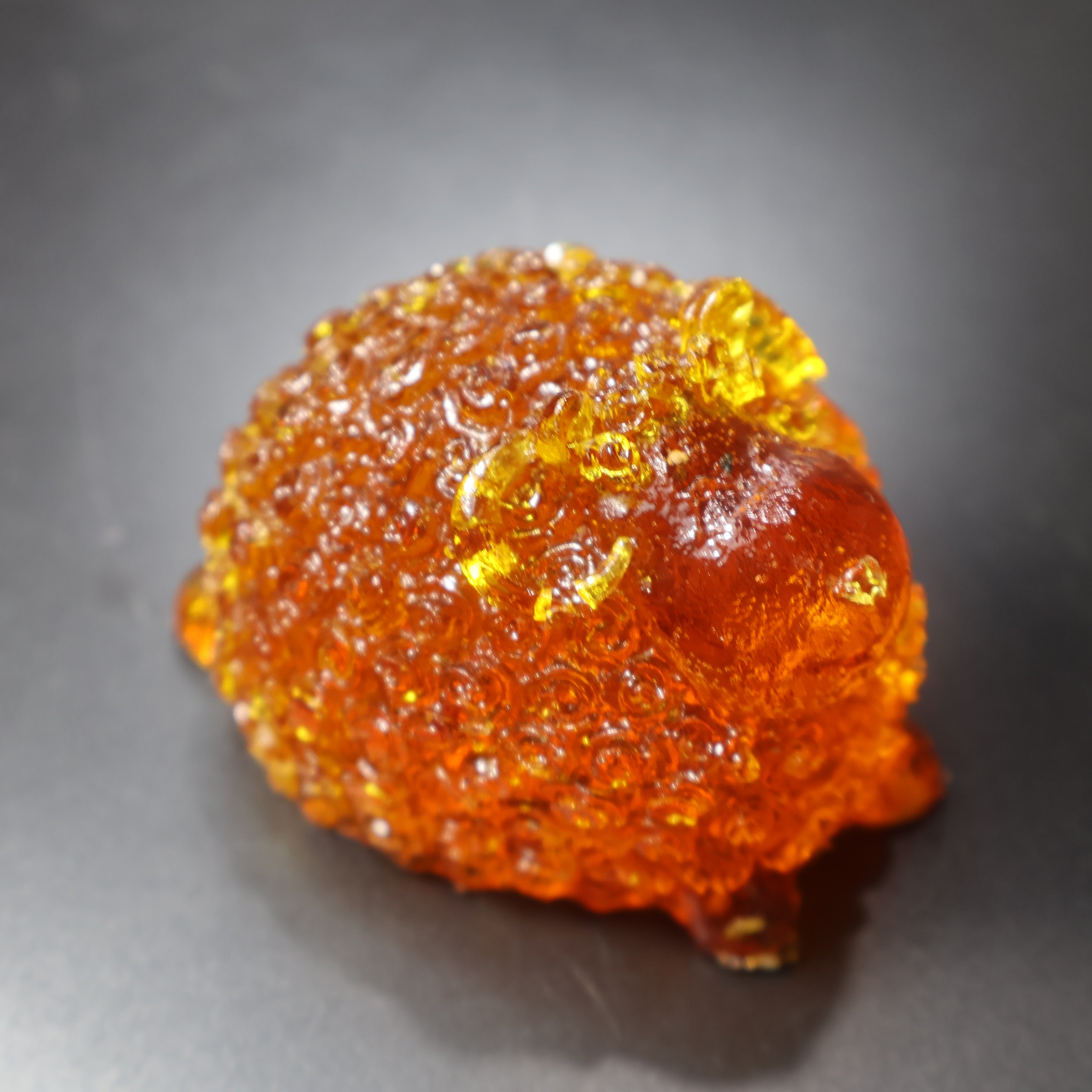Handcrafted amber ram figurine with curved horns golden Baltic amber