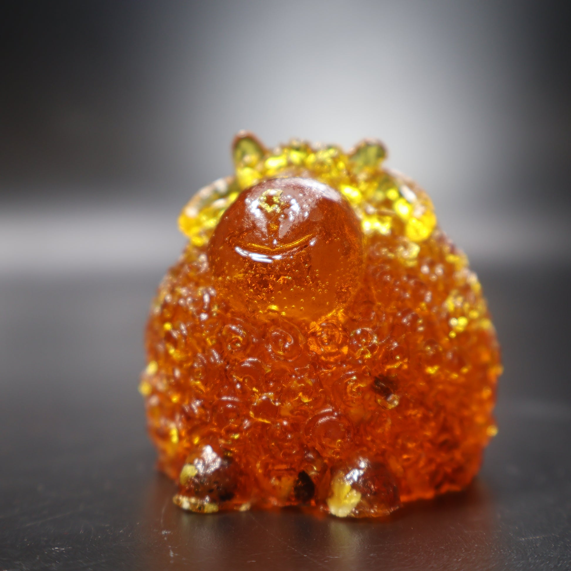 Natural amber ram figurine Christmas decor detail view