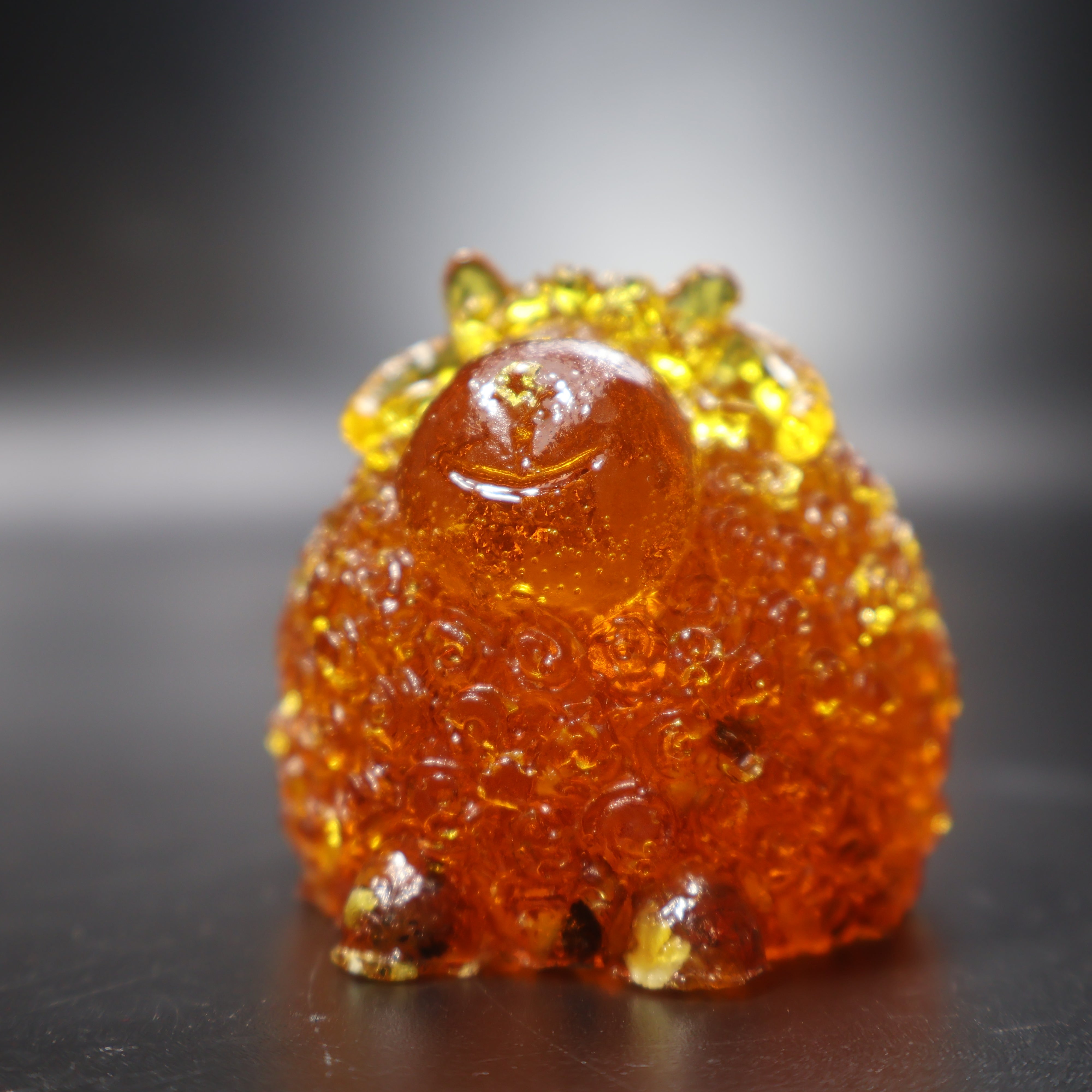 Natural amber ram figurine Christmas decor detail view