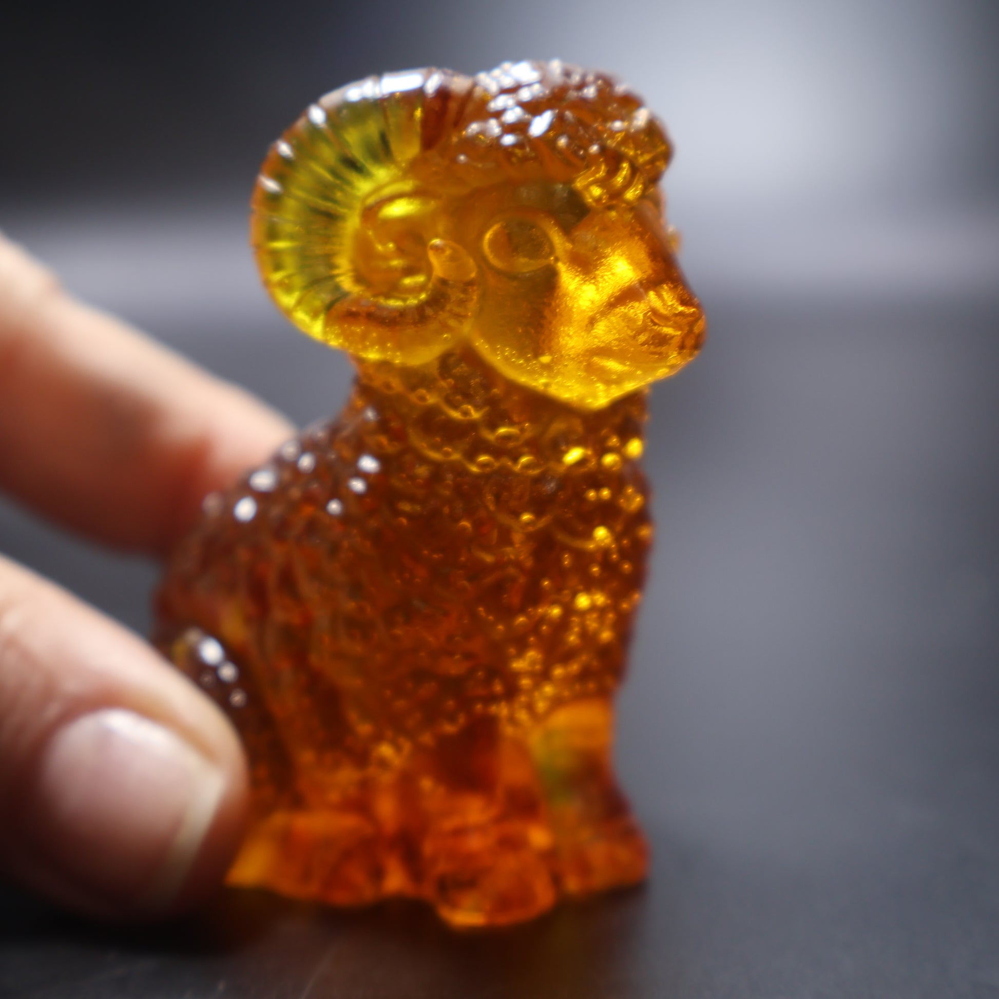 Natural Baltic amber ram sculpture Christmas gift KIZIMA detail