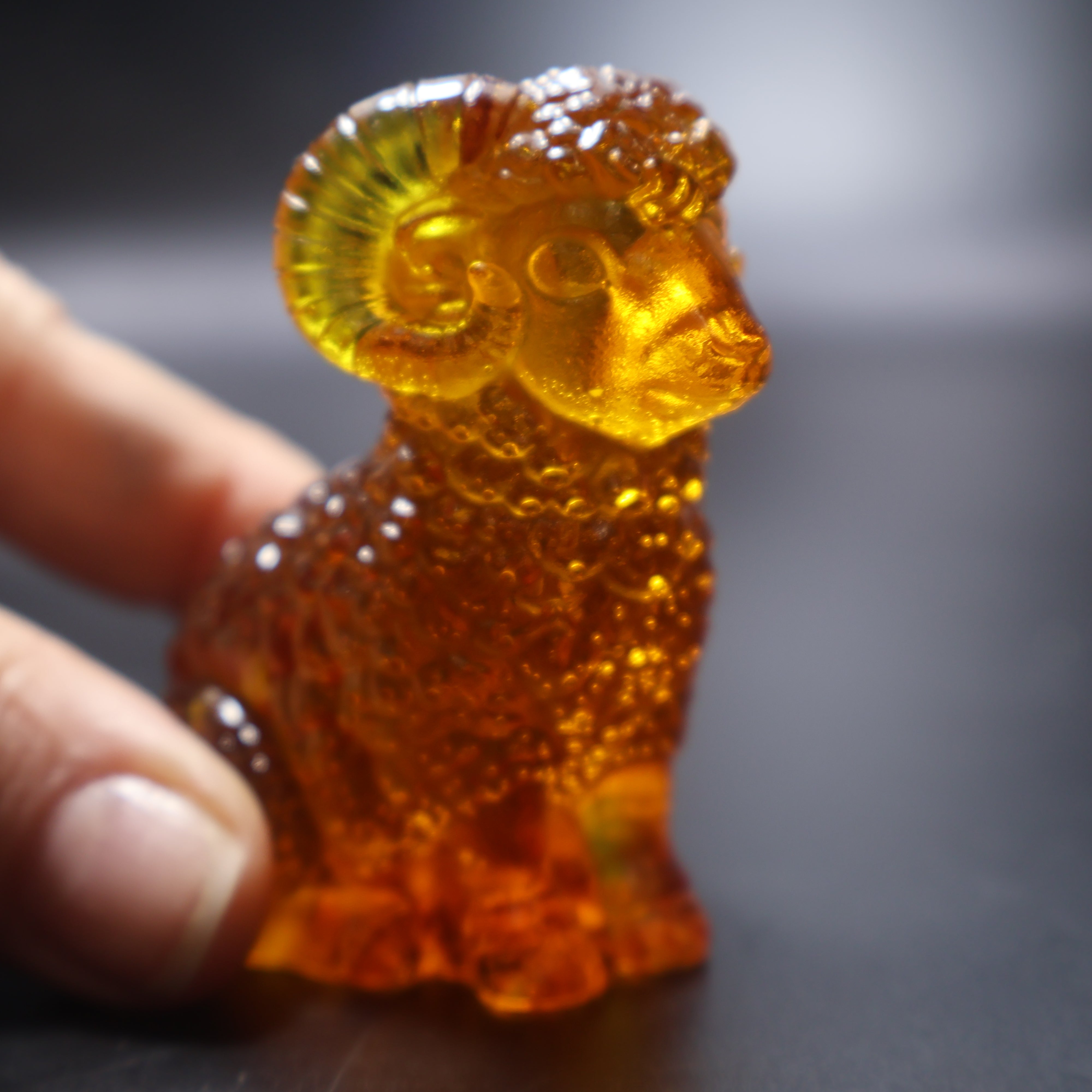 Natural Baltic amber ram sculpture Christmas gift KIZIMA detail