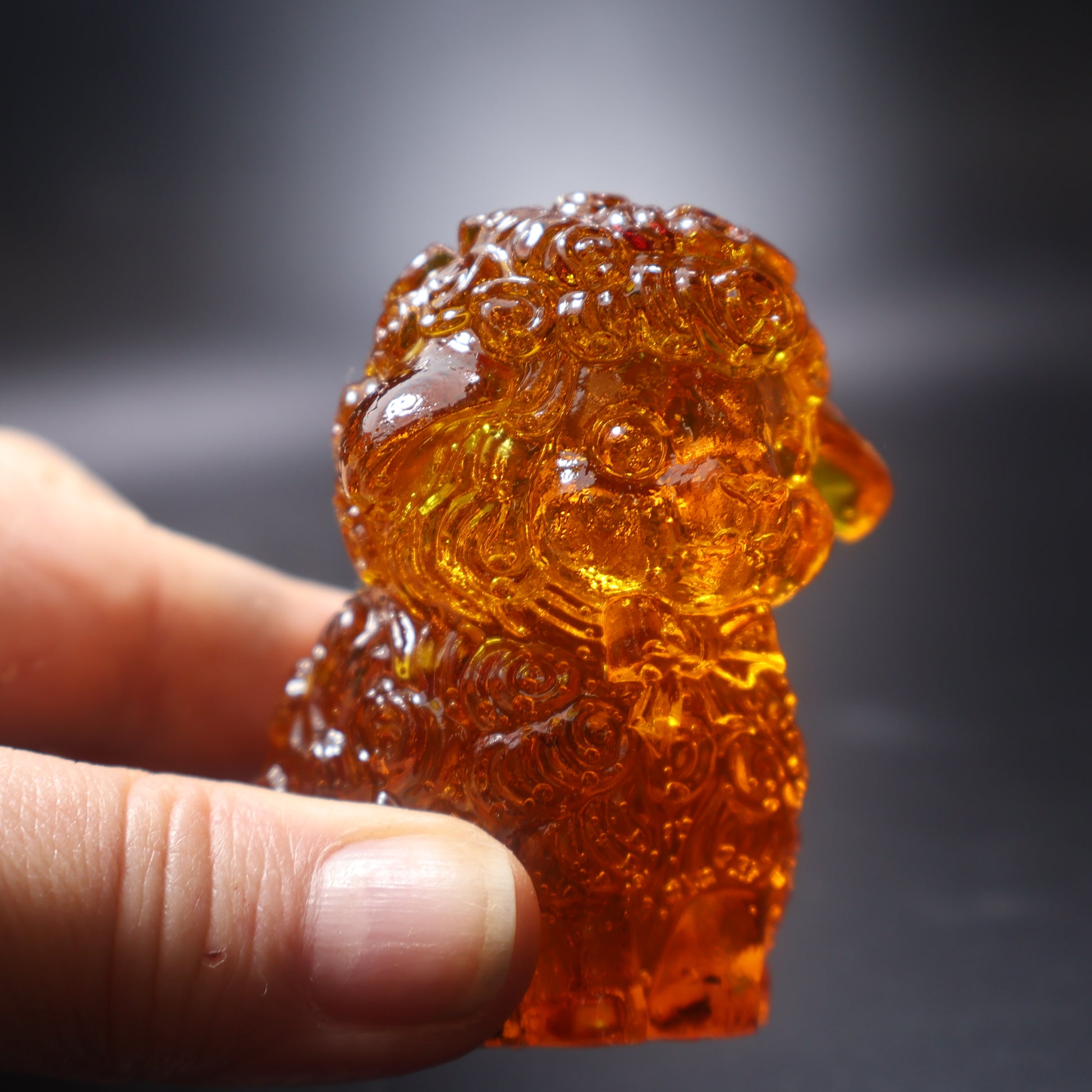 Natural amber sheep figurine Christmas decor detail view