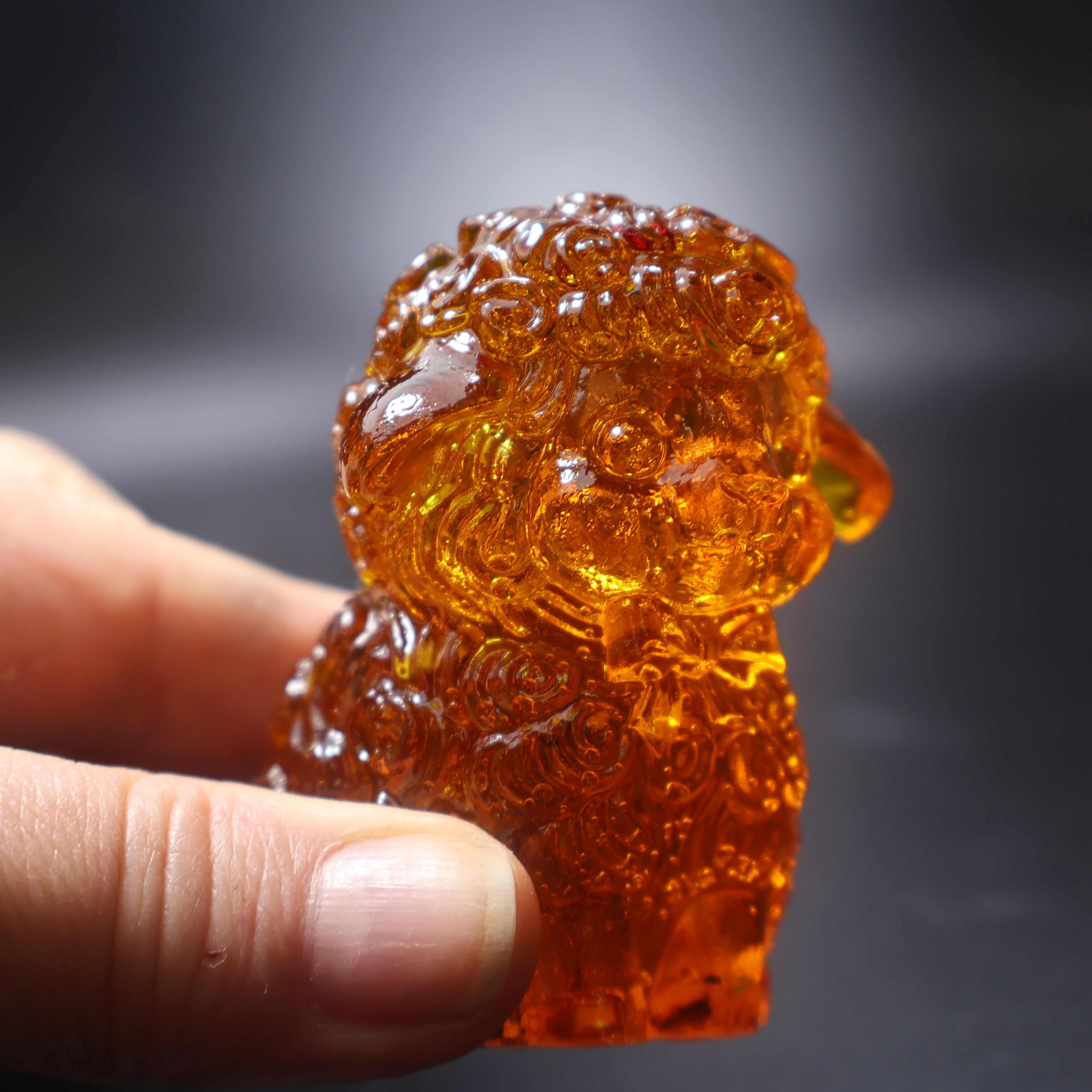 Natural amber sheep figurine Christmas decor detail view