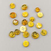Natural Baltic Amber button shades and inner patterns by KIZIMA®; sold individually in a random color