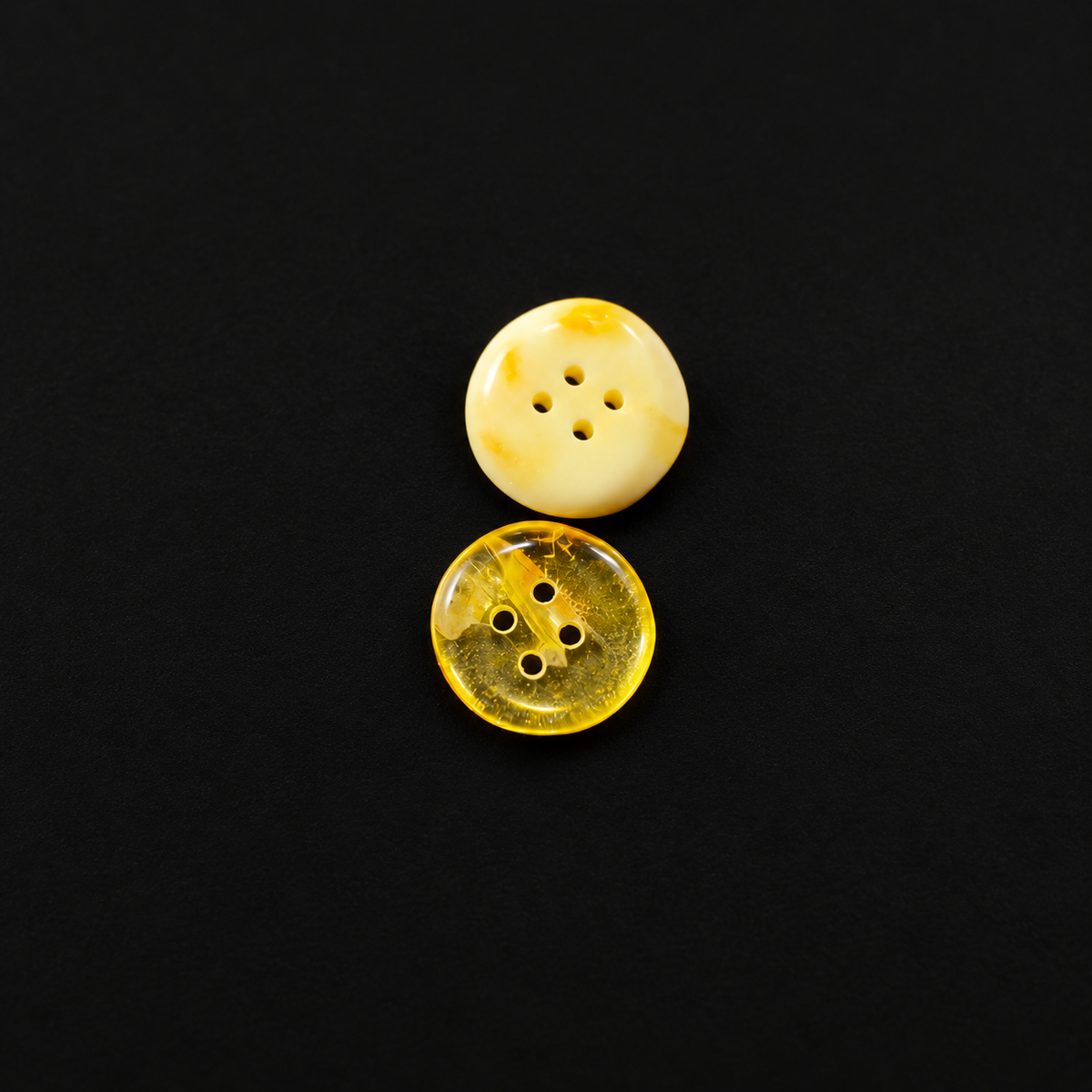 Made in USA Natural Baltic Amber sewing buttons by KIZIMA® in cream and transparent honey shades; price is for one random-color button