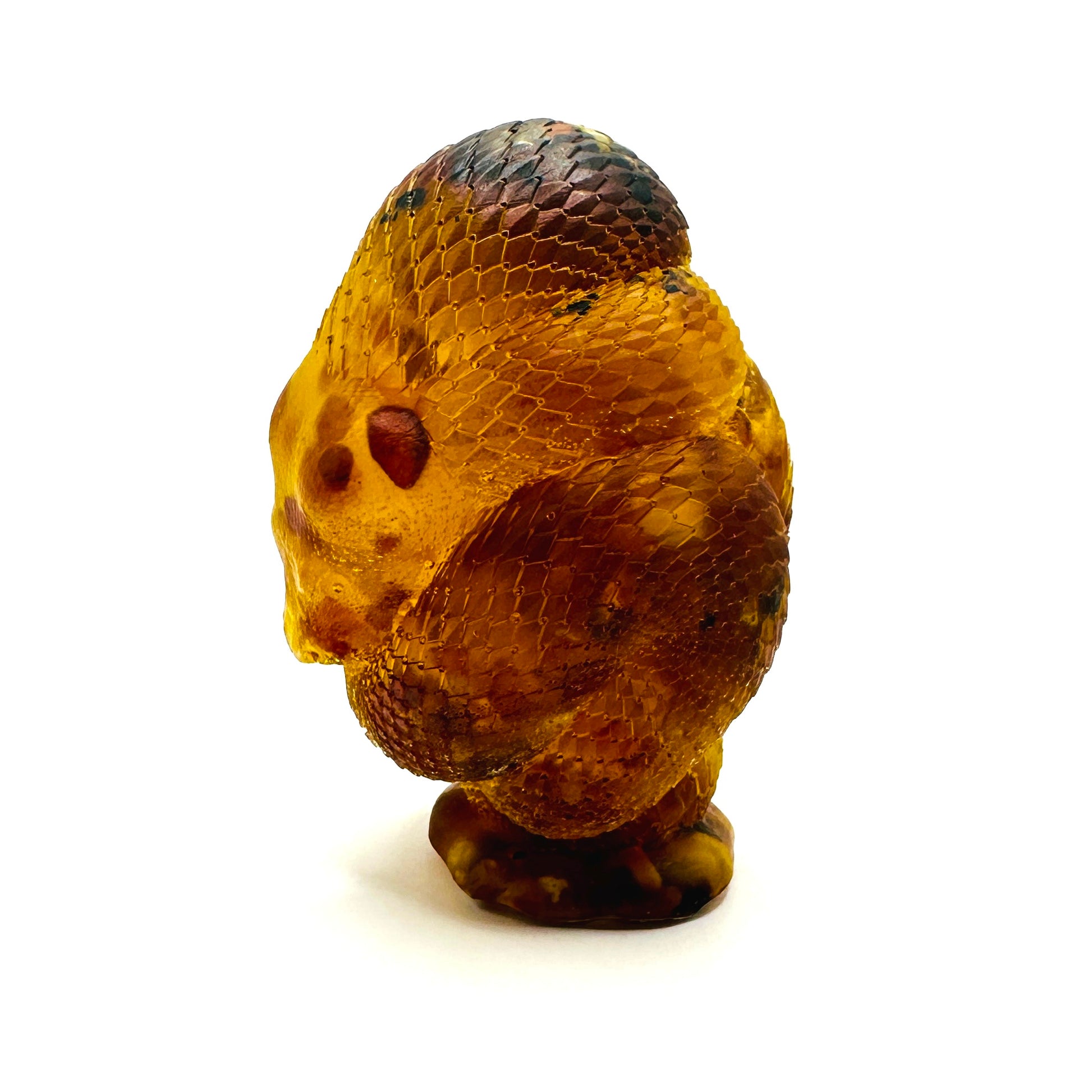 KIZIMA® amber coiled snake figurine — genuine Baltic amber decor, handmade in USA, close-up