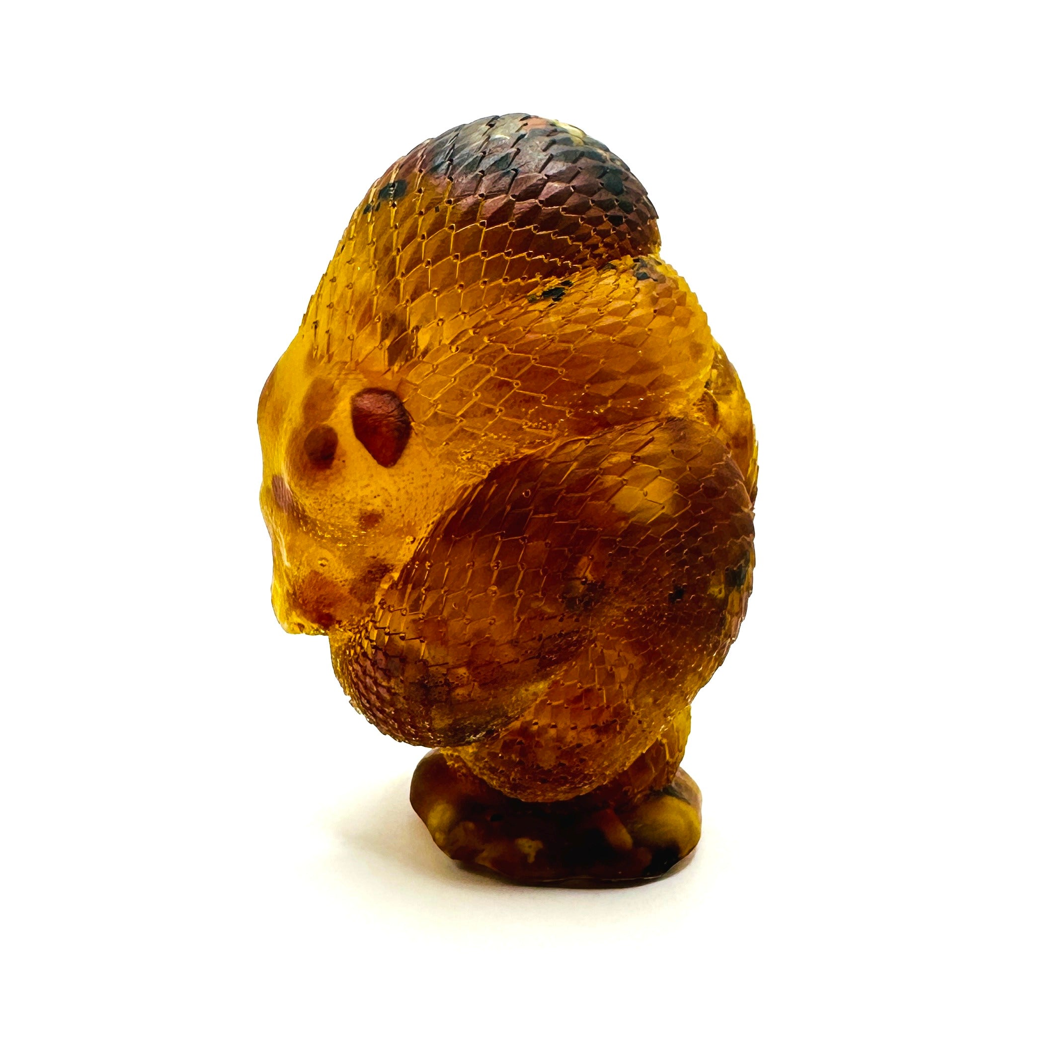KIZIMA® amber coiled snake figurine — genuine Baltic amber decor, handmade in USA, close-up