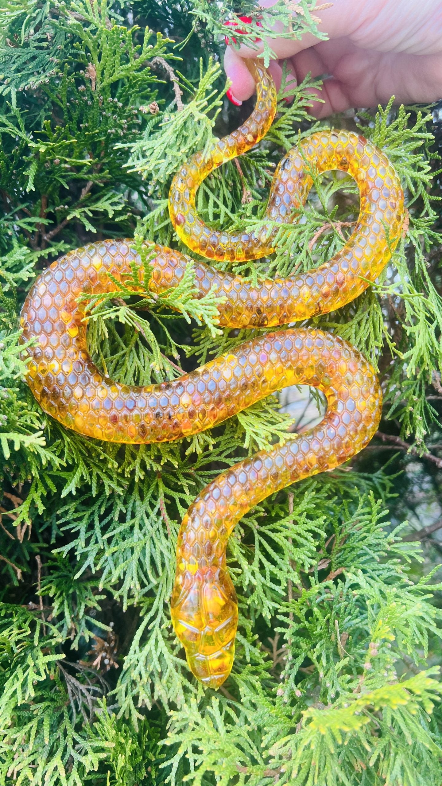 Baltic amber magical snake figurine by KIZIMA® — genuine amber, handmade in USA, side angle