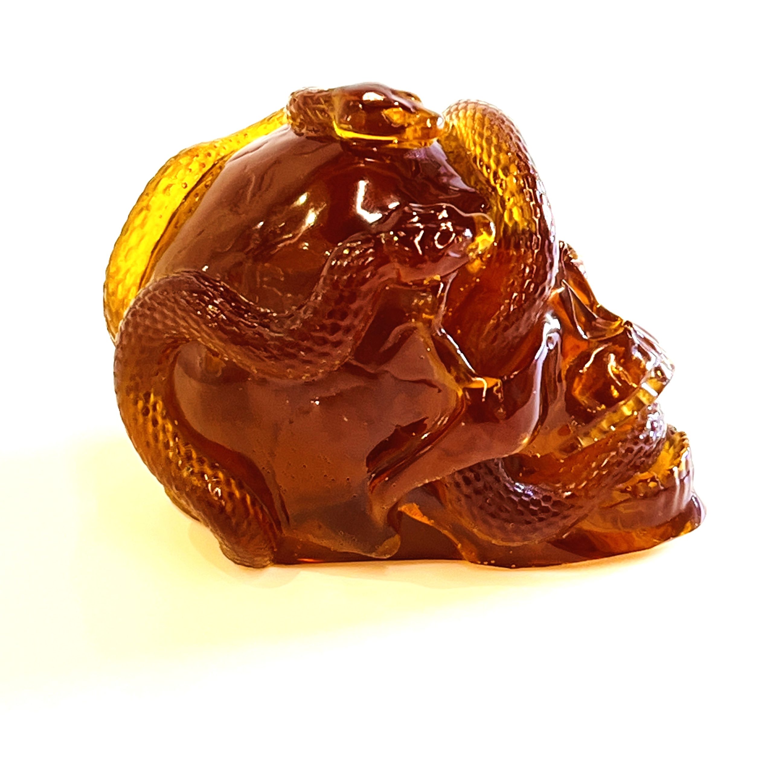KIZIMA® skull and snake Baltic amber figurine — genuine amber decor, handmade in USA, detail view