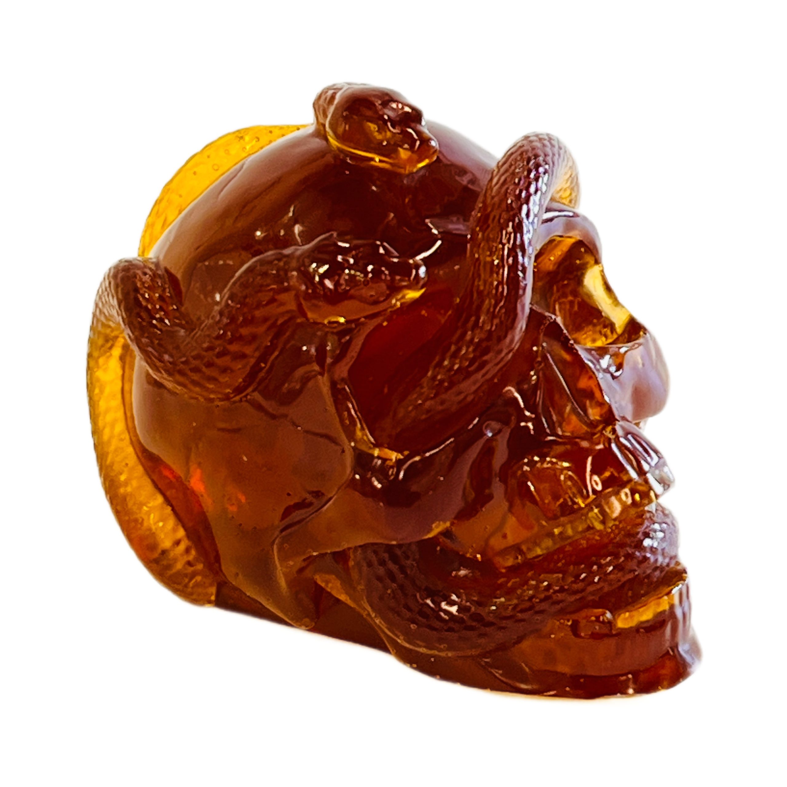 KIZIMA® amber skull and snake sculpture — genuine Baltic amber decor, made in USA, detail view