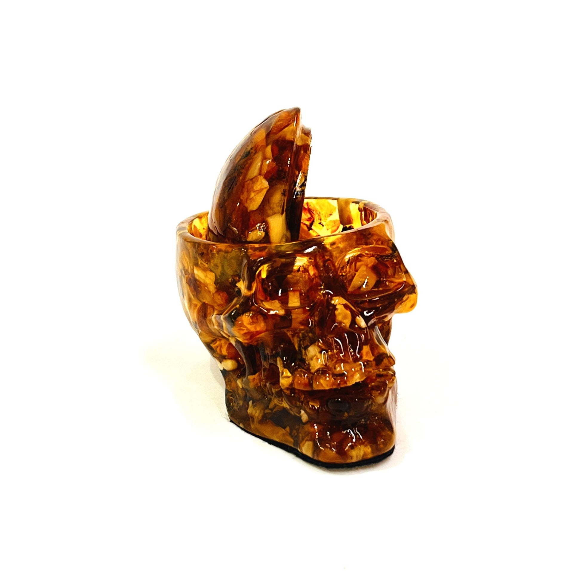 Handmade Baltic amber skull and snake box by KIZIMA® USA — natural amber decor, side view