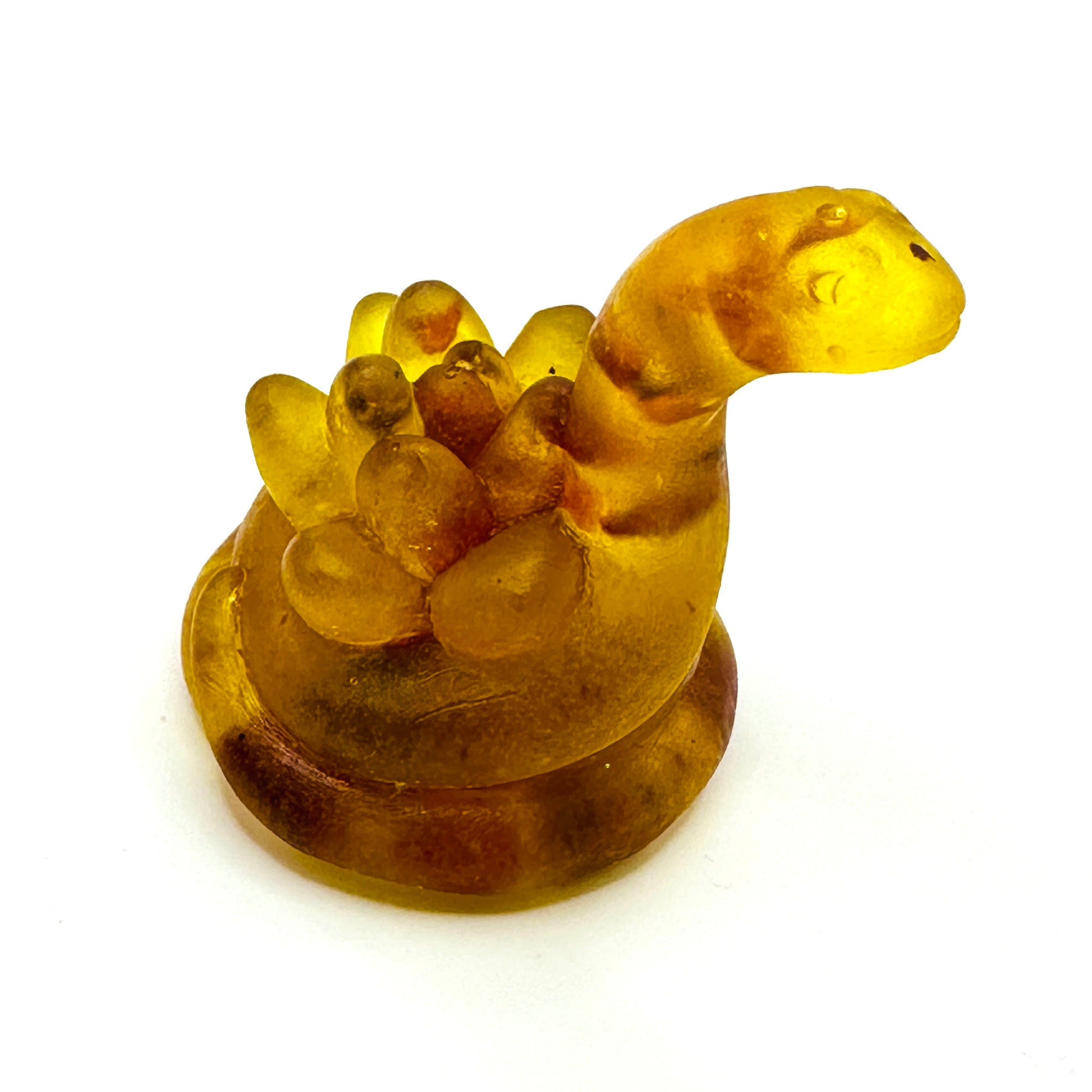 Handmade Baltic amber snake figurine by KIZIMA® USA — natural amber decor, side view
