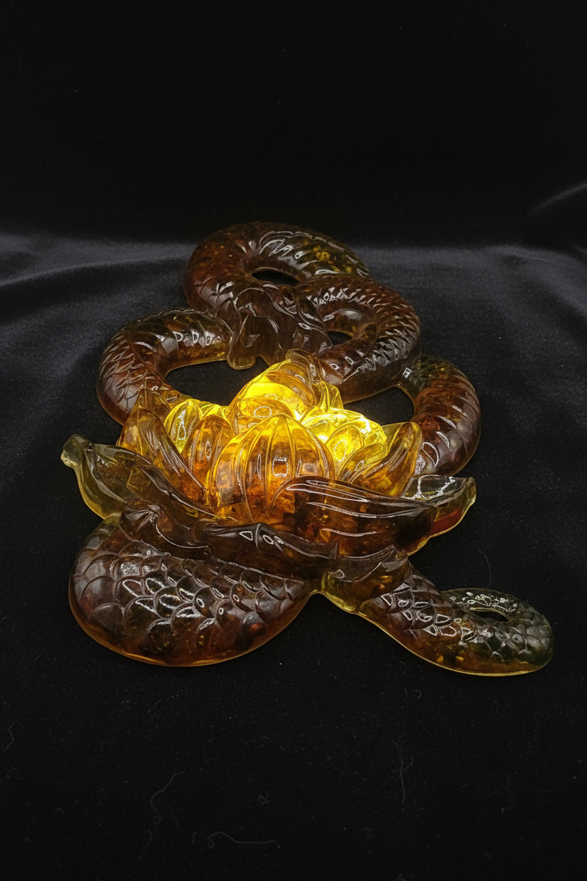 KIZIMA® amber snake with lily figurine — genuine Baltic amber decor, handmade in USA, angled detail