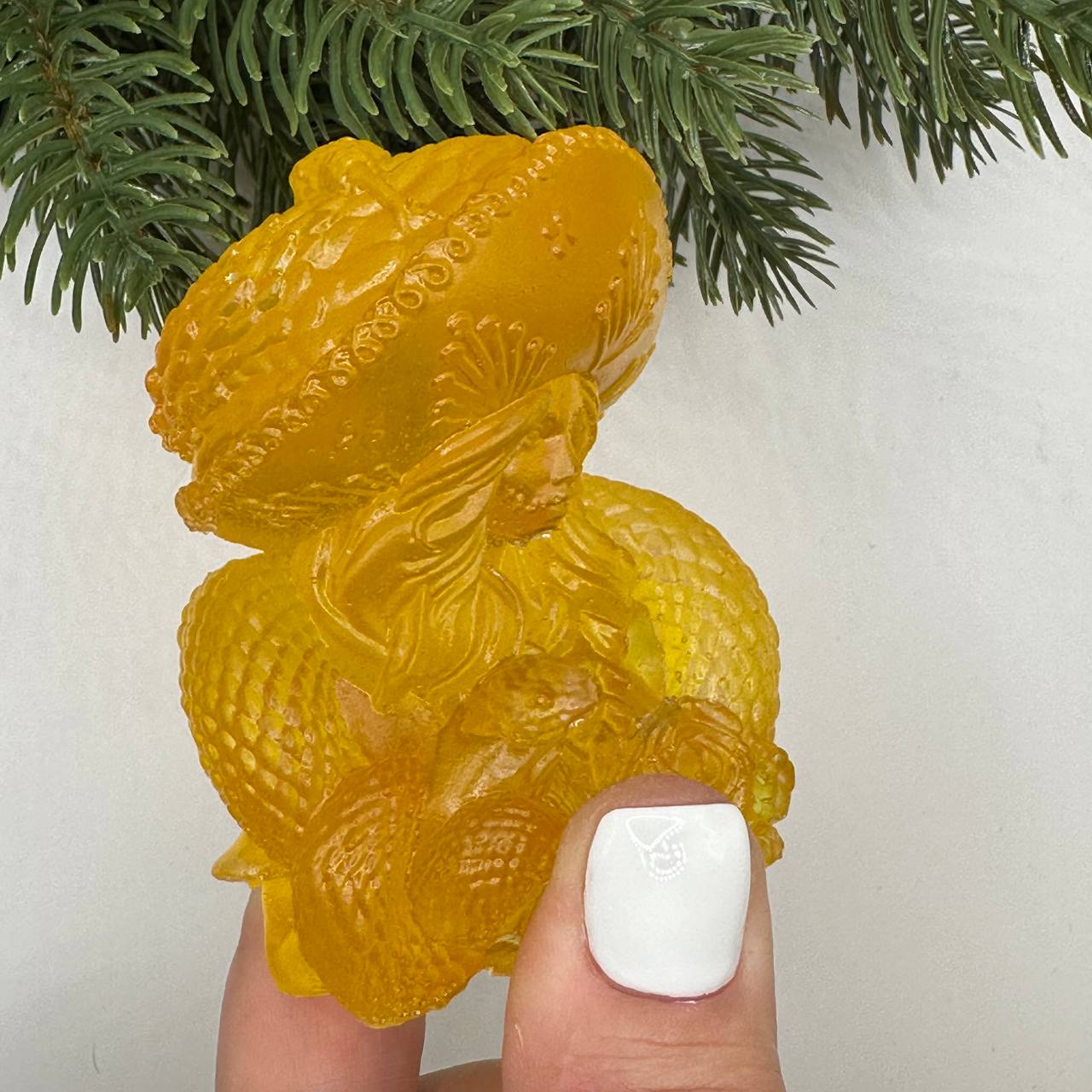 KIZIMA® woman with snake Baltic amber figurine — genuine amber decor, handmade in USA, detail view