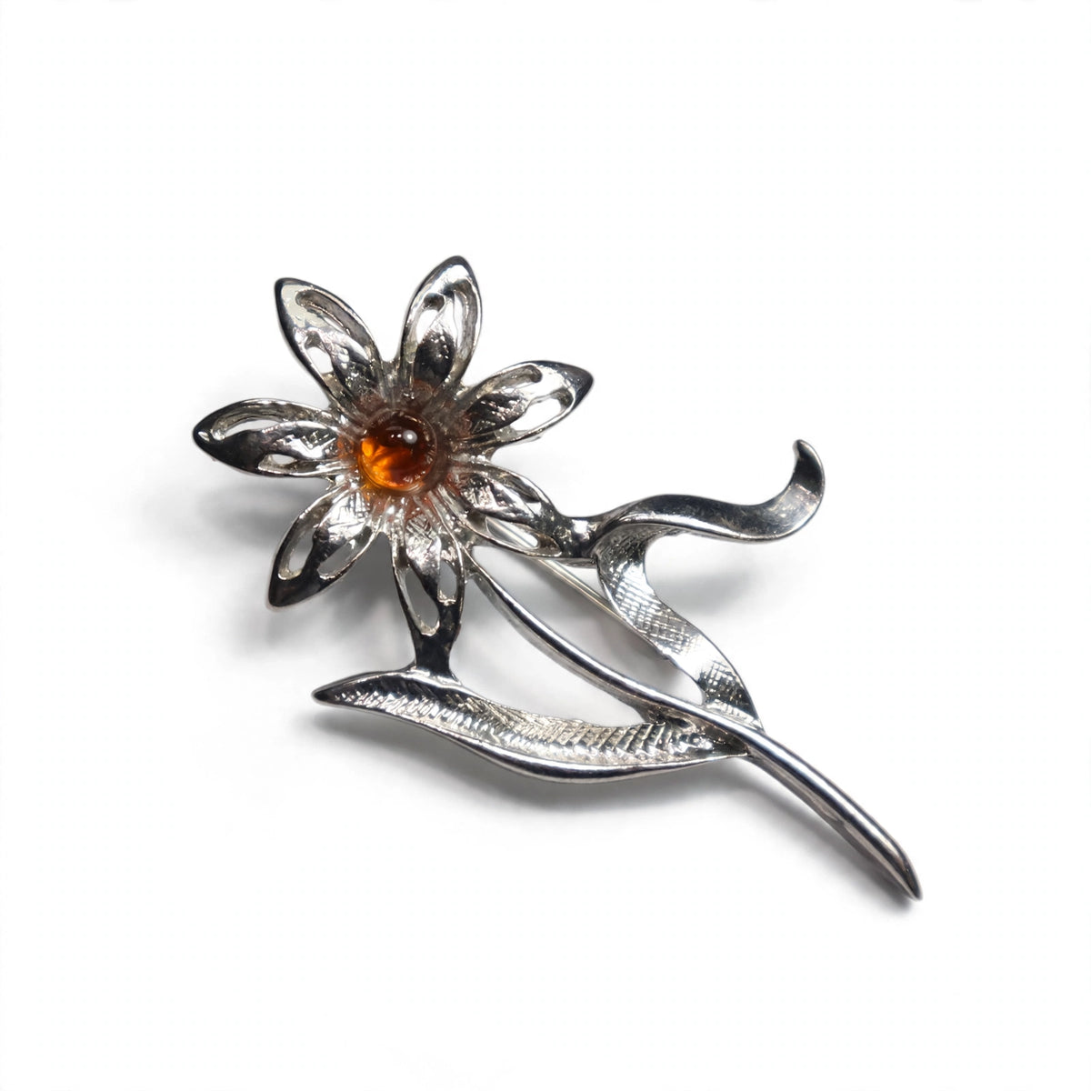 Handmade Baltic amber daisy brooch on white background — KIZIMA, Made in USA