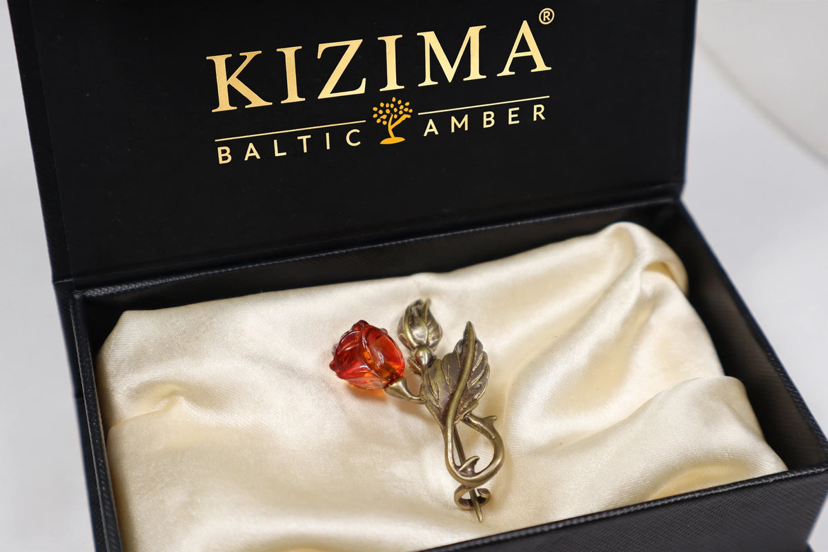 Handmade Baltic amber flower & bud brooch in black KIZIMA gift box — Made in USA