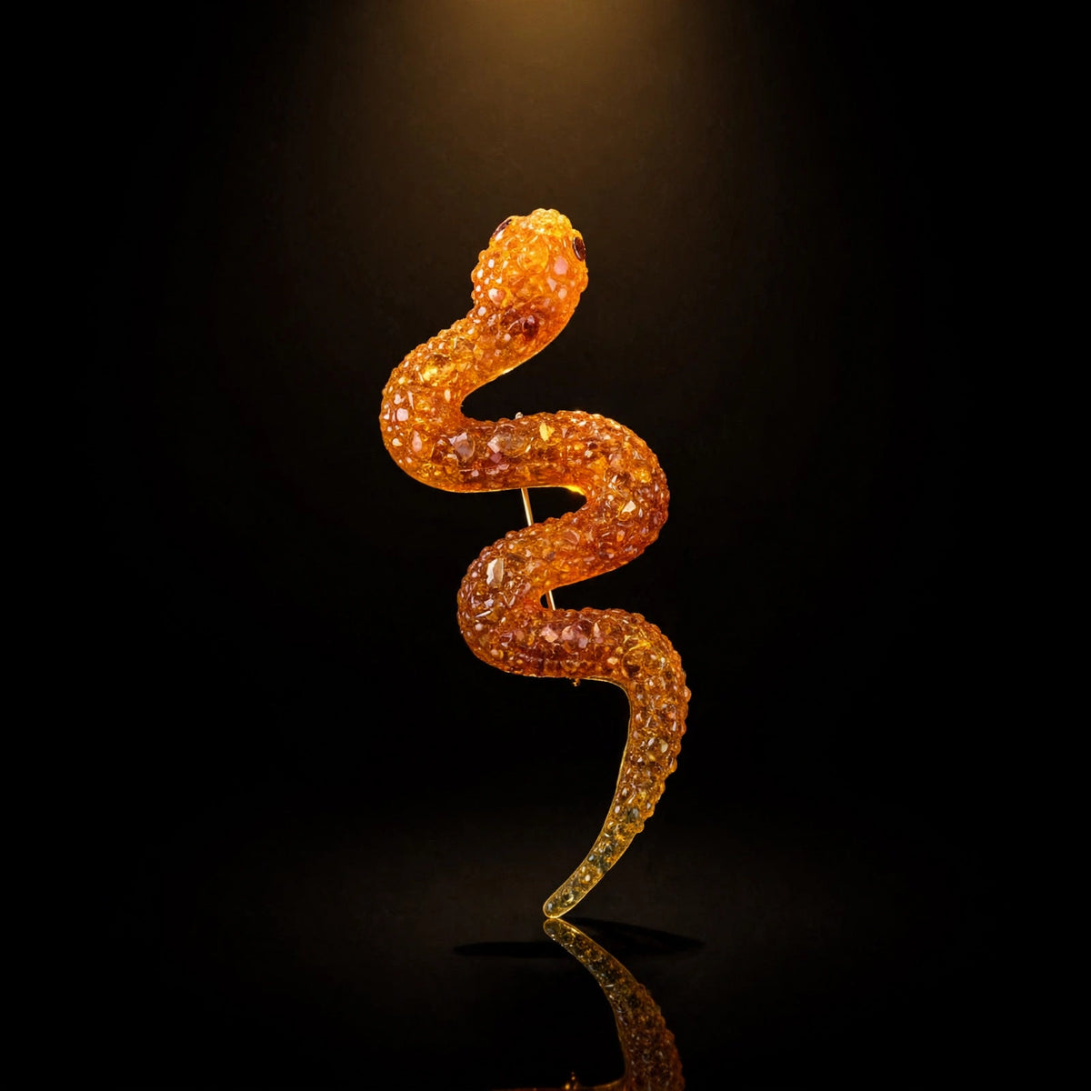 Handmade Baltic amber snake brooch, luxury studio photo on black background — KIZIMA, Made in USA