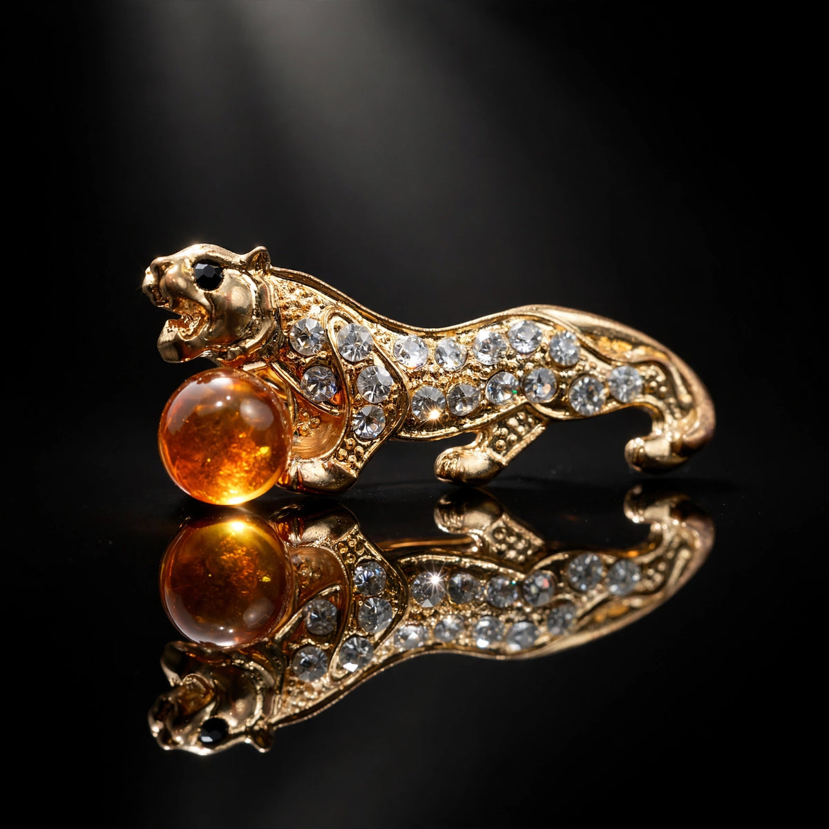 Handmade Baltic amber tiger brooch, luxury studio photo on black background — KIZIMA, Made in USA