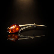 Handmade Baltic amber tulip brooch, luxury studio photo on black background — KIZIMA, Made in USA