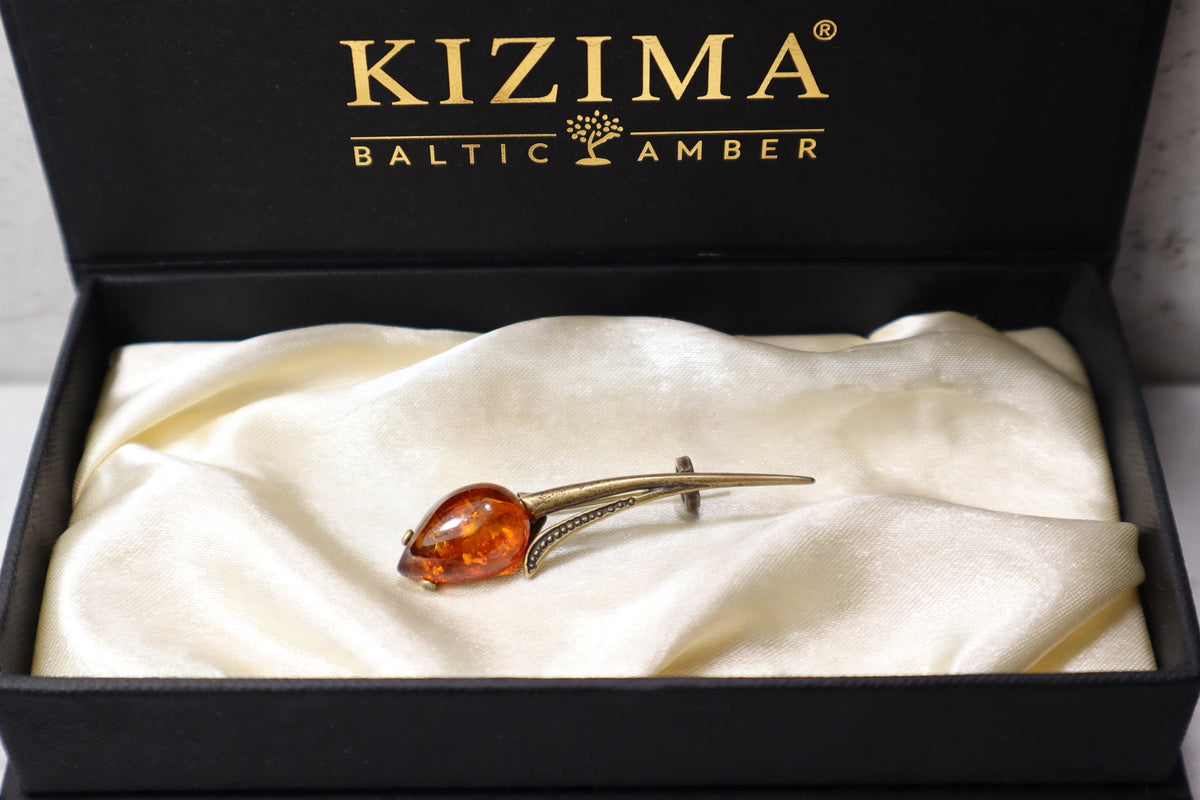 Handmade Baltic amber tulip brooch in black KIZIMA gift box — Made in USA