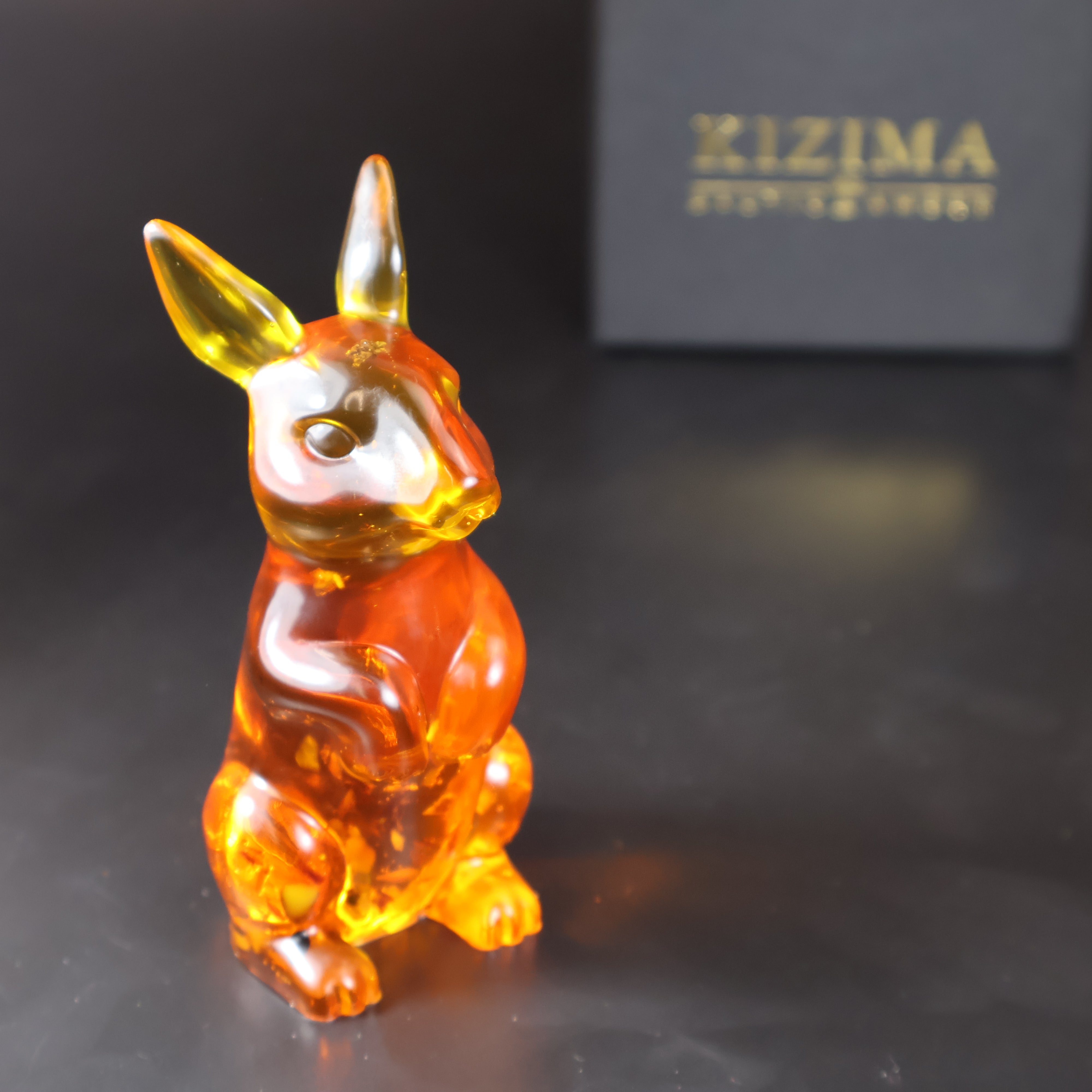 Baltic amber kangaroo figurine side view honey amber souvenir