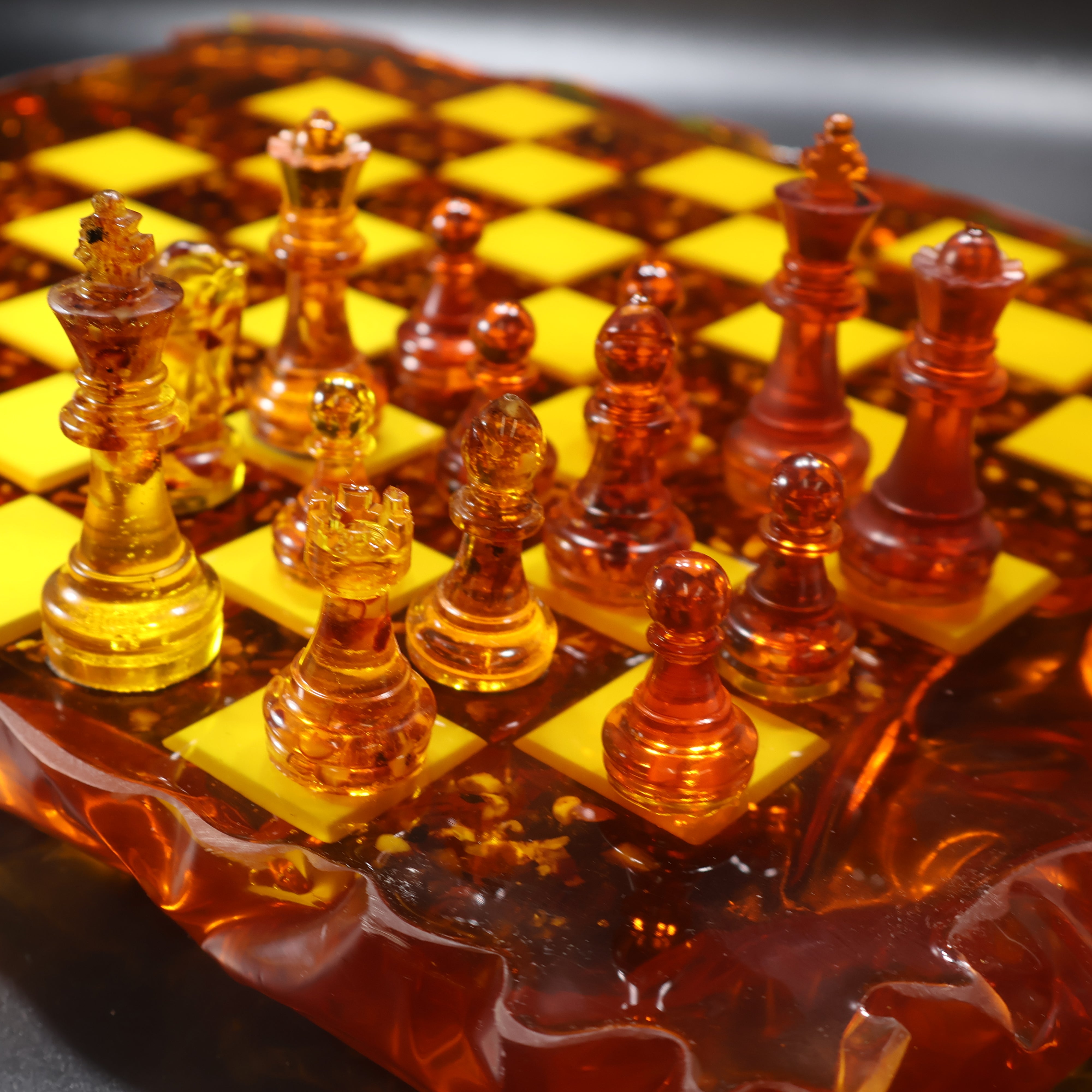 Carved free-form amber slab chess board detail, natural Baltic amber, KIZIMA workshop