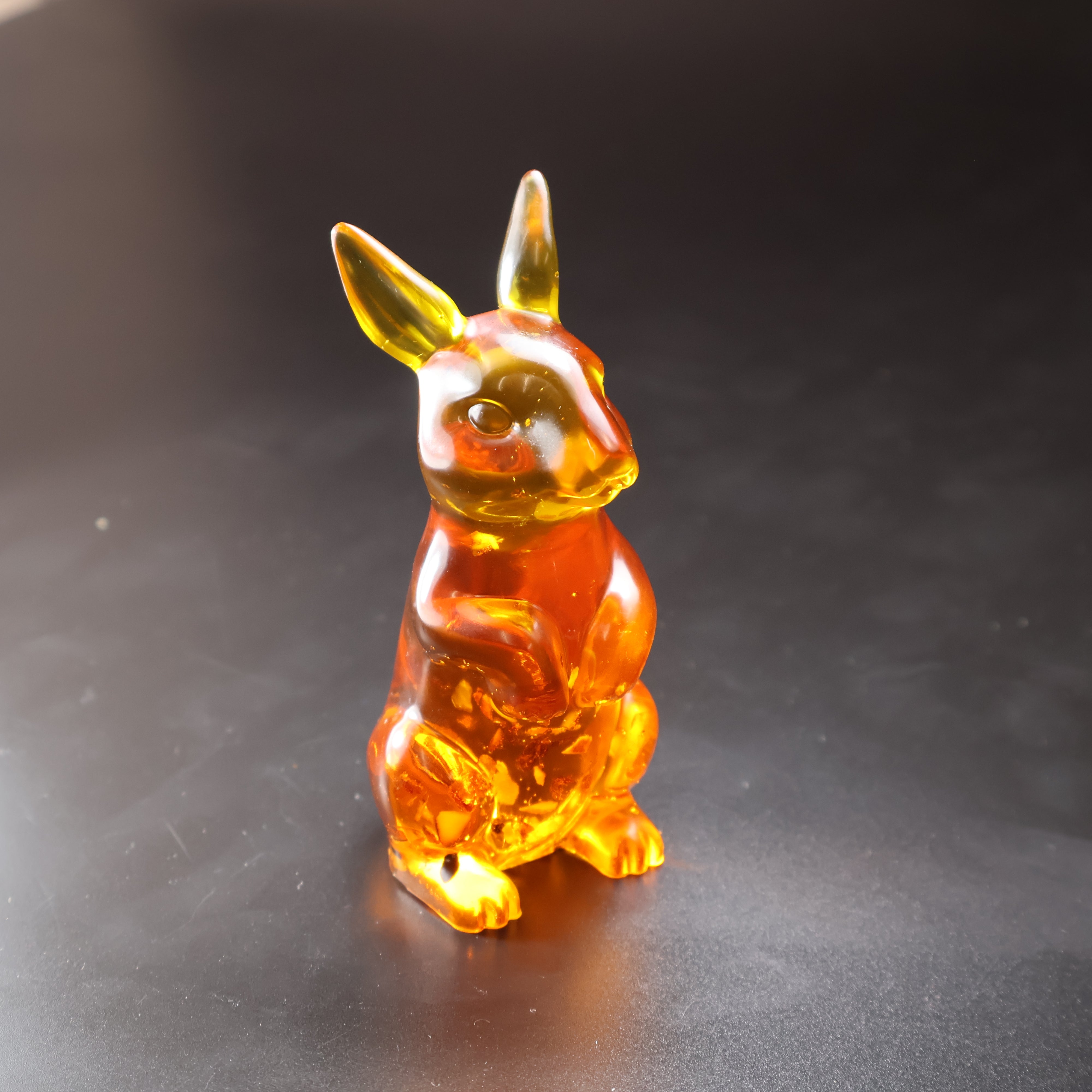 Natural Baltic amber kangaroo figurine detail view KIZIMA handcrafted
