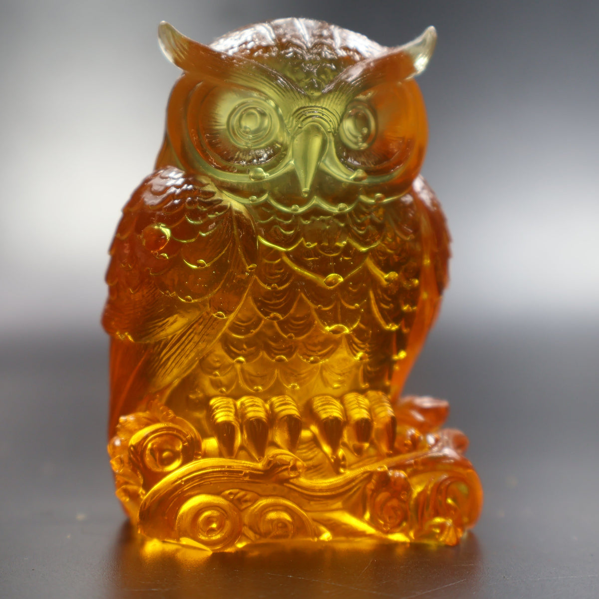 Baltic amber owl on ornate carved base, cognac to gold gradient, American amber decor