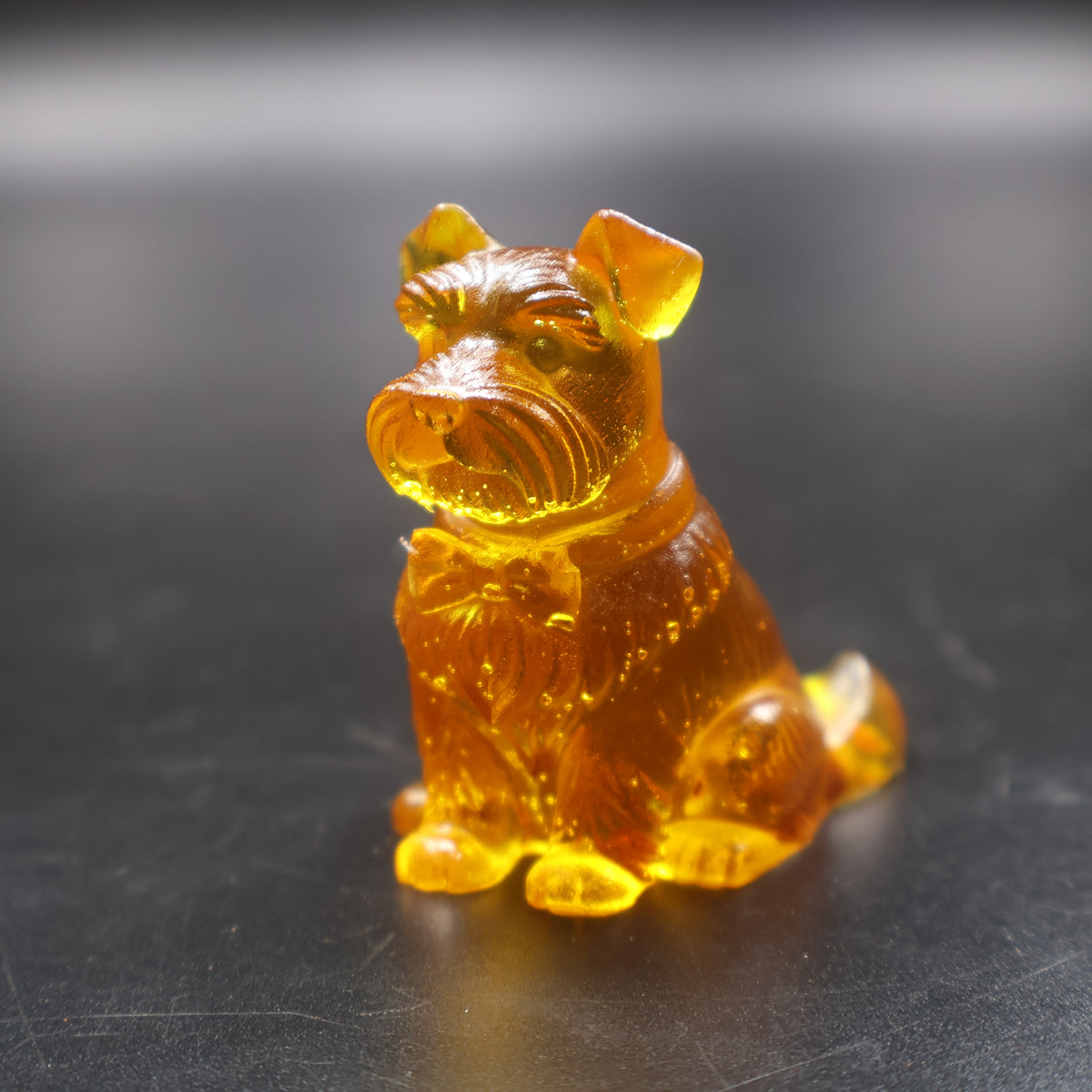 Amber Schnauzer dog statuette glowing in light, Made in USA collectible gift