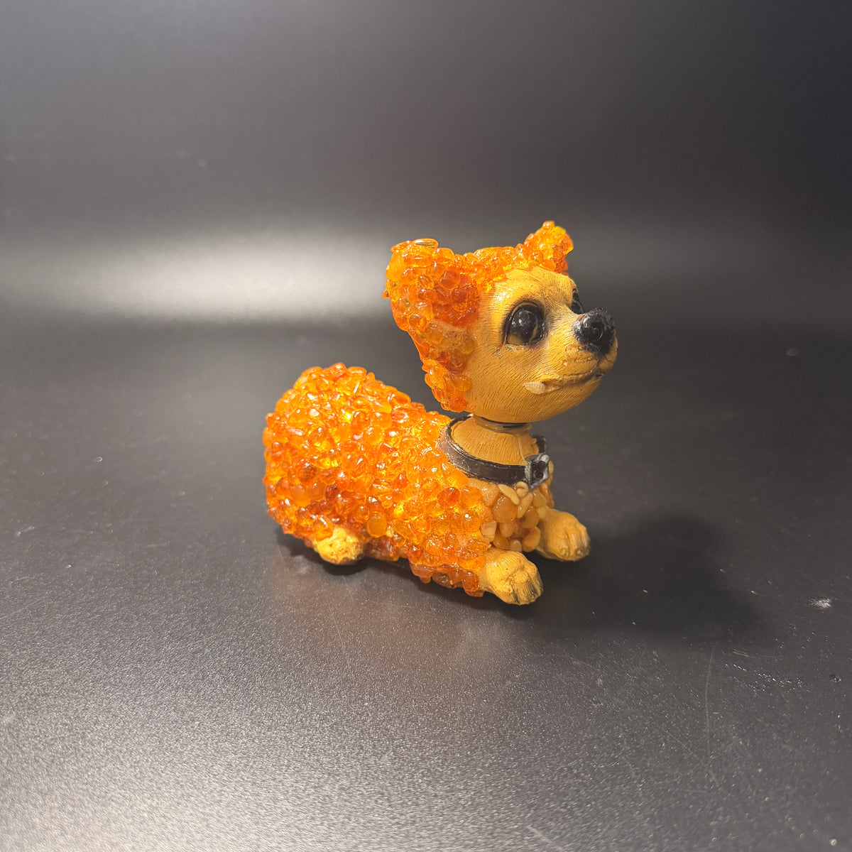 Made in USA natural Baltic amber bobblehead dog figurine, light honey amber puppy three-quarter view — handcrafted by KIZIMA® Brooklyn NY