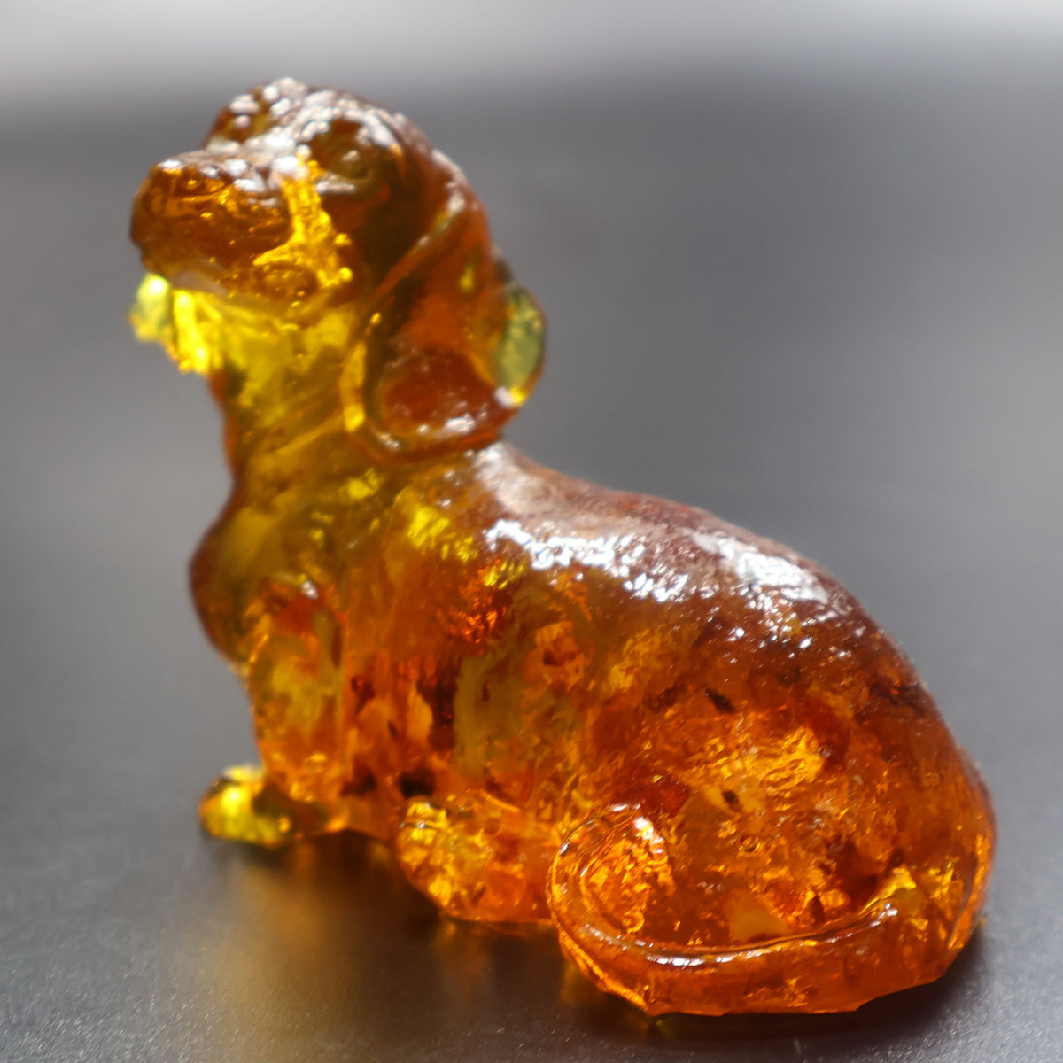 Golden Baltic amber Dachshund figurine with floppy ears, handmade in Brooklyn New York