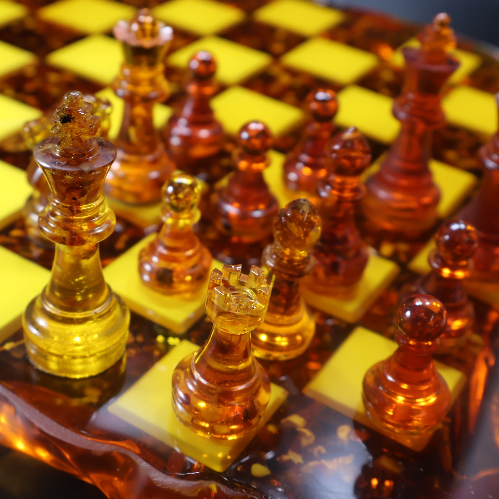 Amber chess set side view, 32 handmade chessmen in cognac and landscape amber, KIZIMA