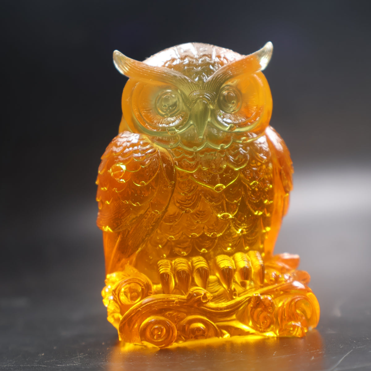 Natural Baltic amber owl figurine on carved scroll base handcrafted in USA by KIZIMA