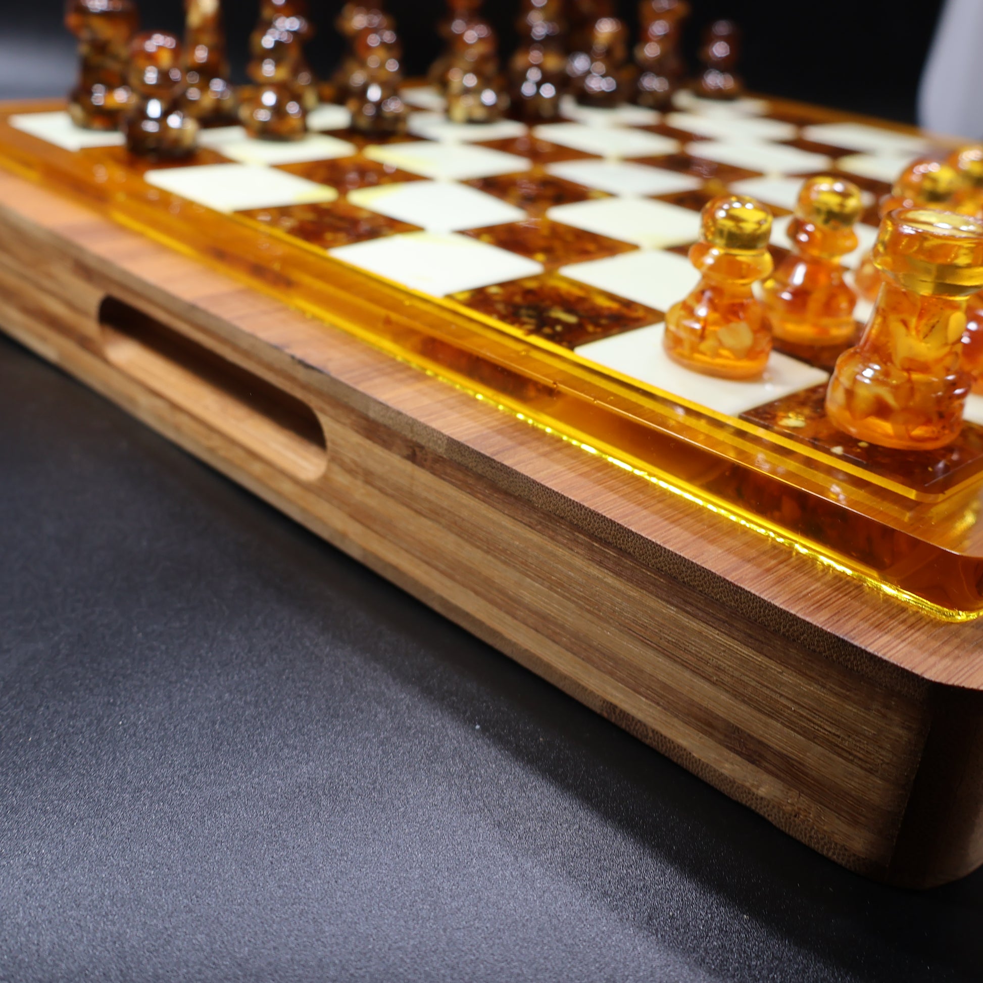 Handmade Baltic amber chess pieces close-up, luxury boss gift, KIZIMA