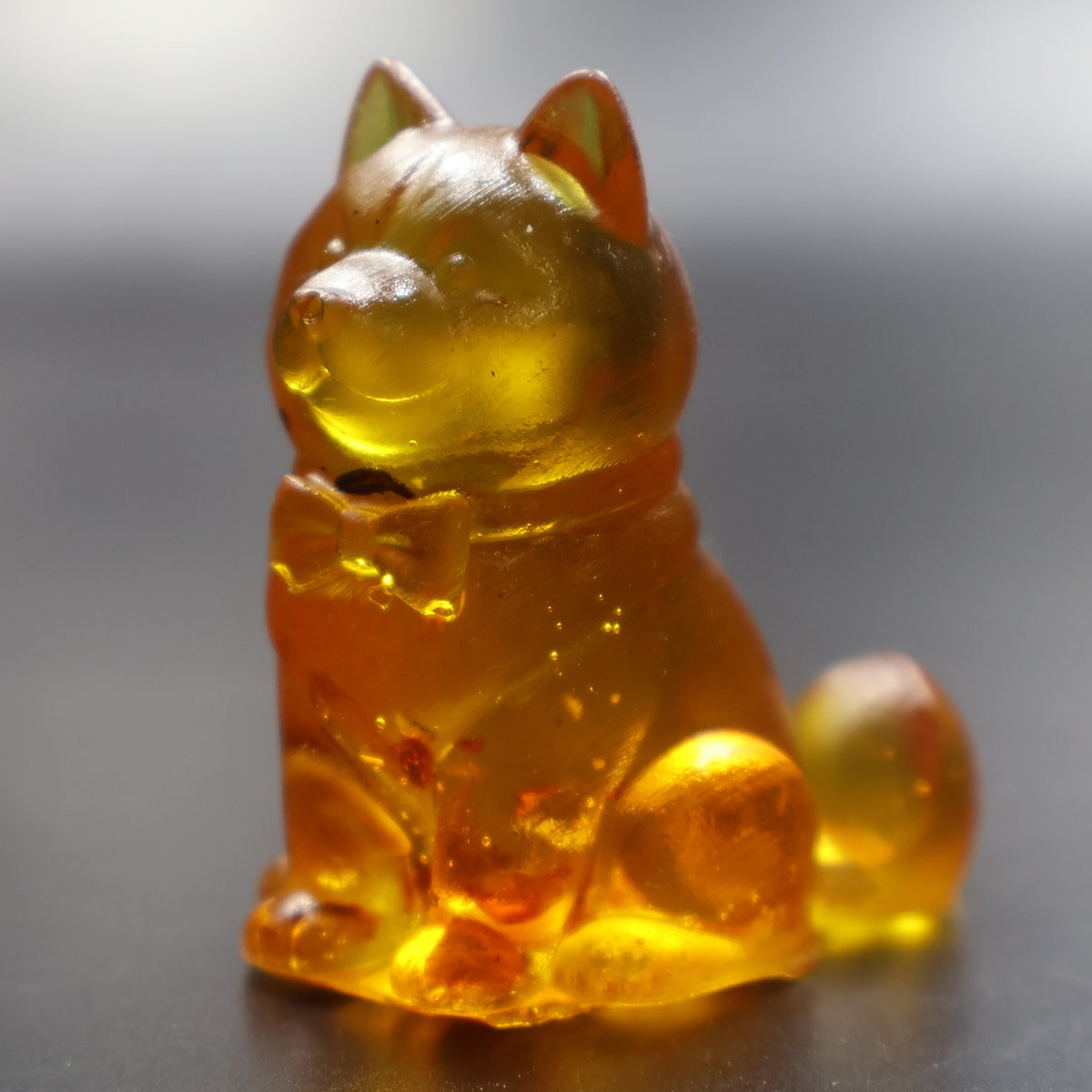 Natural Baltic amber puppy dog figurine with ball handcrafted in USA by KIZIMA