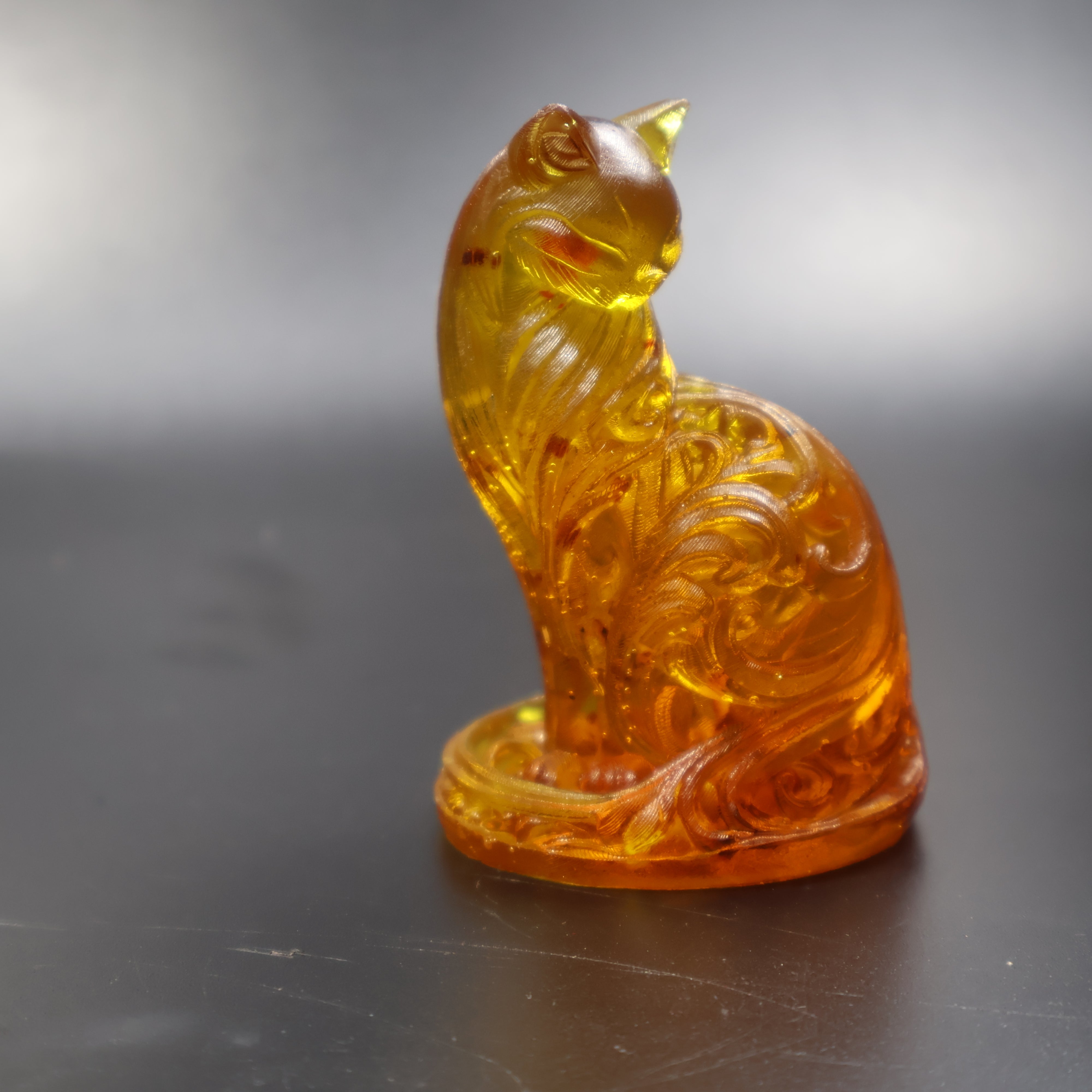 Amber cat statuette with Art Nouveau ornament glowing in light, Made in USA gift