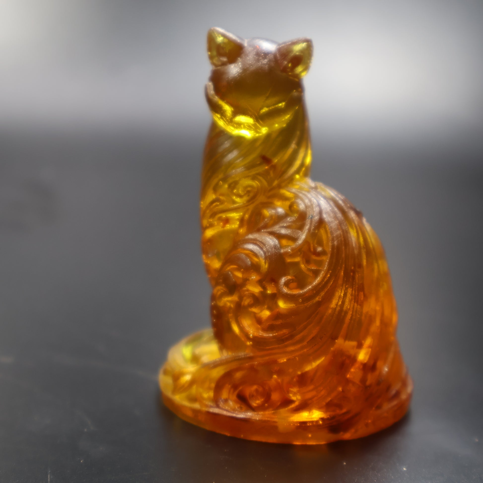 Baltic amber cat figurine detail of head and ears, amber collectible Brooklyn NY