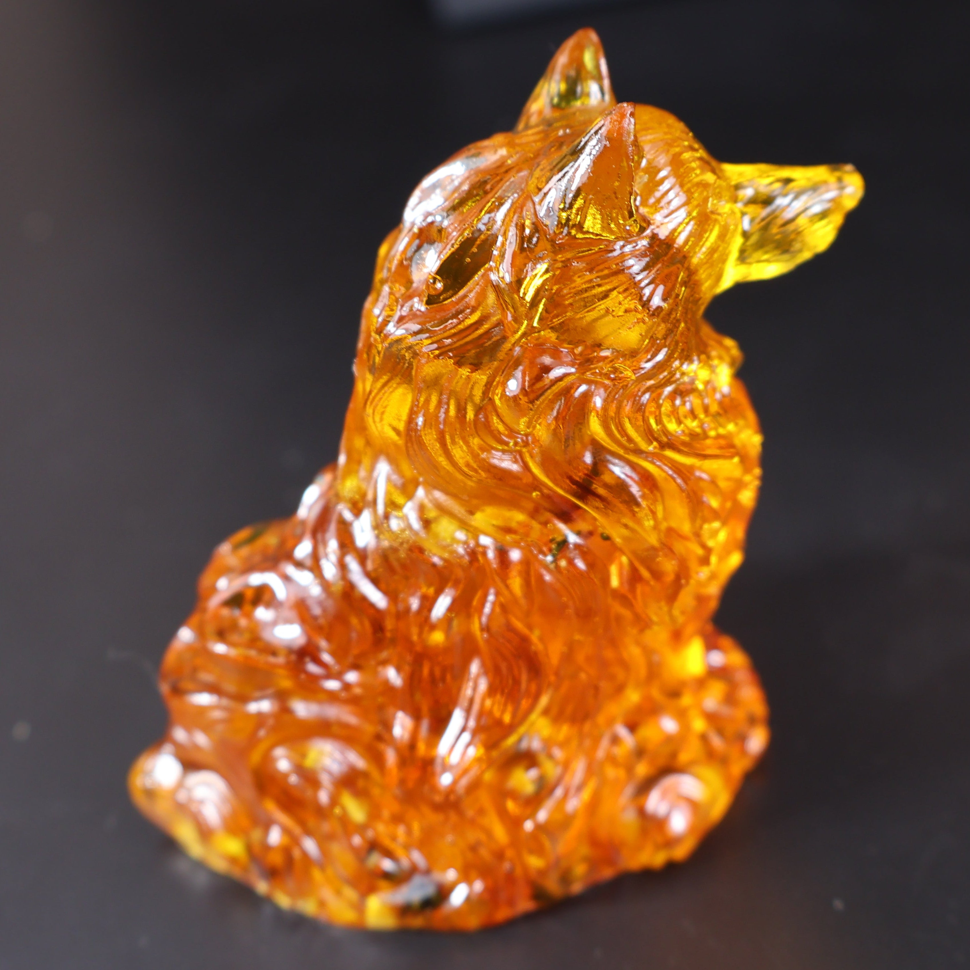 Natural Baltic amber wolf figurine detail honey cognac tones KIZIMA
