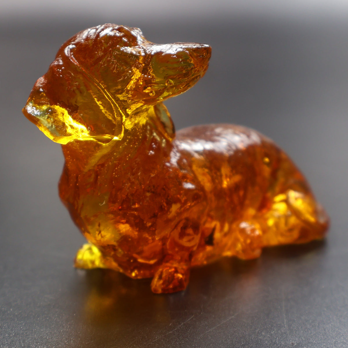 Amber sausage dog figurine with natural inclusions, dog lover gift Made in USA