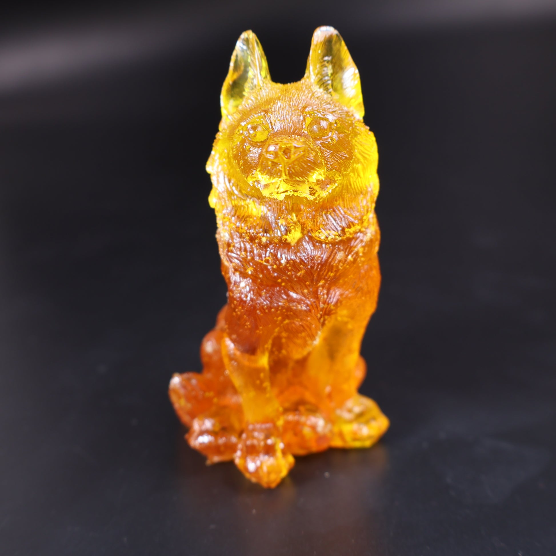 Handcrafted natural Baltic amber wolf figurine made in USA by KIZIMA