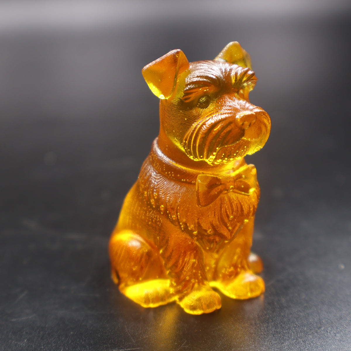 Natural Baltic amber Schnauzer dog figurine three-quarter view, KIZIMA Brooklyn