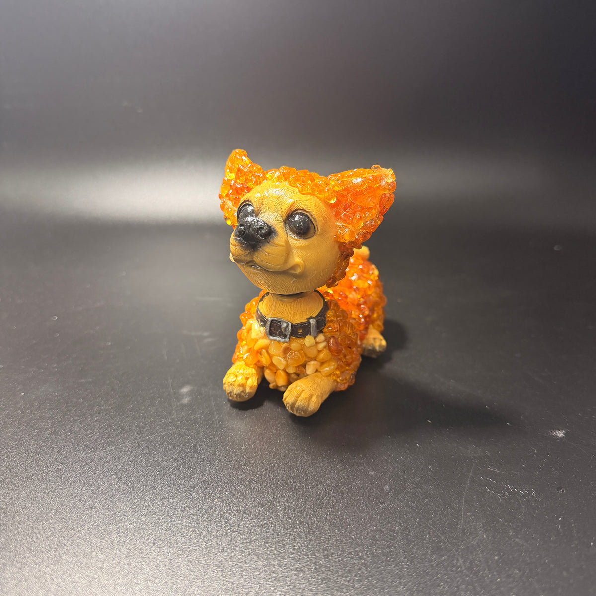 Made in USA natural Baltic amber bobblehead dog figurine, light honey amber puppy sitting with nodding head, front view — KIZIMA® Brooklyn NY