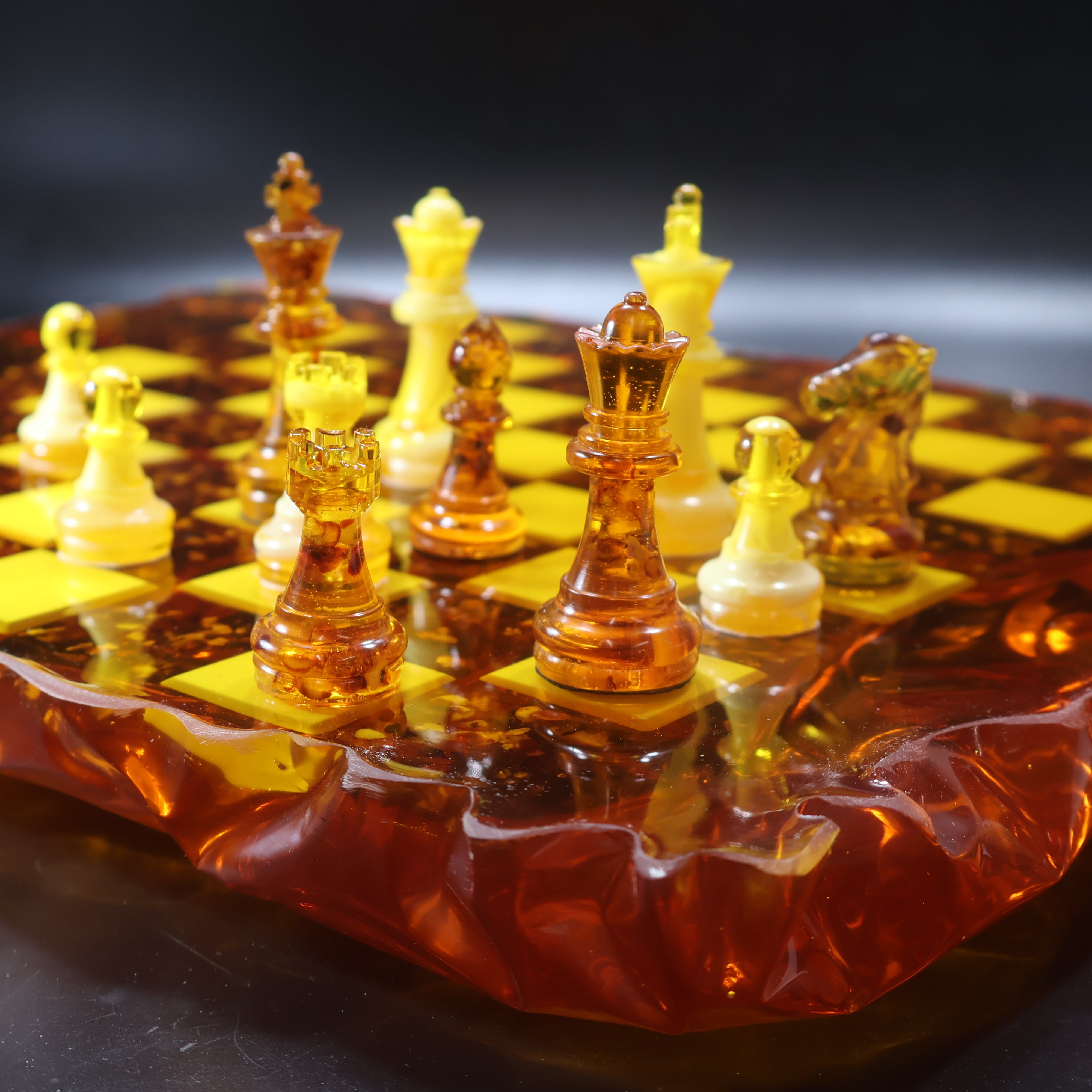 Handmade Baltic amber chess set with cognac and landscape amber pieces, made in Brooklyn New York