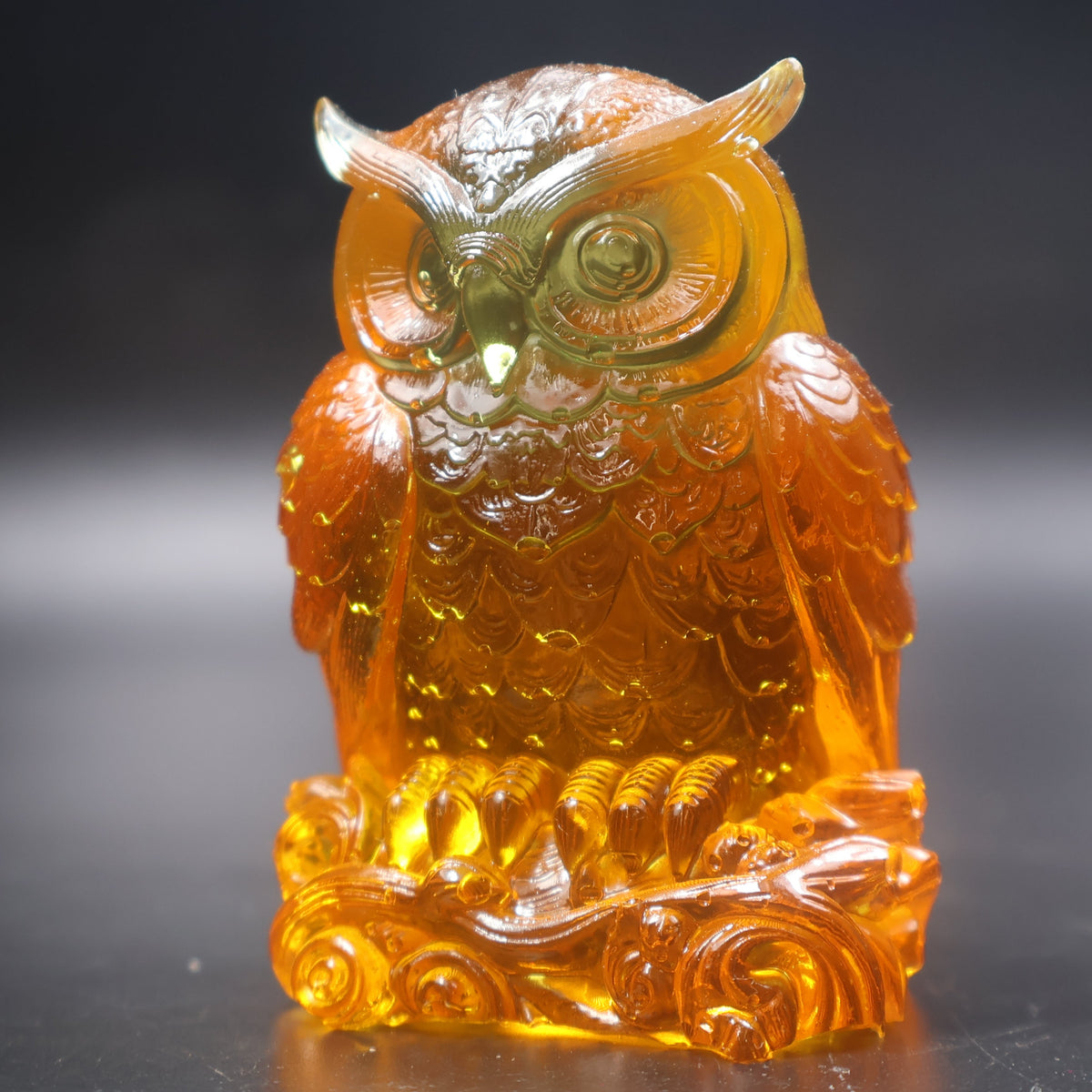 Golden Baltic amber wise owl figurine with detailed feathers, handmade in Brooklyn New York