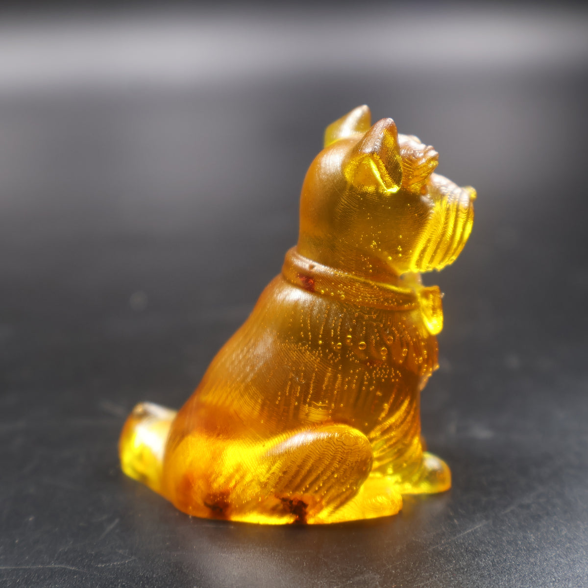 Amber Schnauzer figurine detail of beard and eyebrows, handmade American amber decor