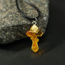 Orthodox cross Baltic amber pendant by KIZIMA® — genuine amber, handmade in USA, detail view