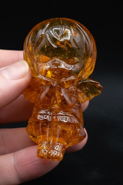 Angel girl Baltic amber figurine — handcrafted in USA by KIZIMA®, front view