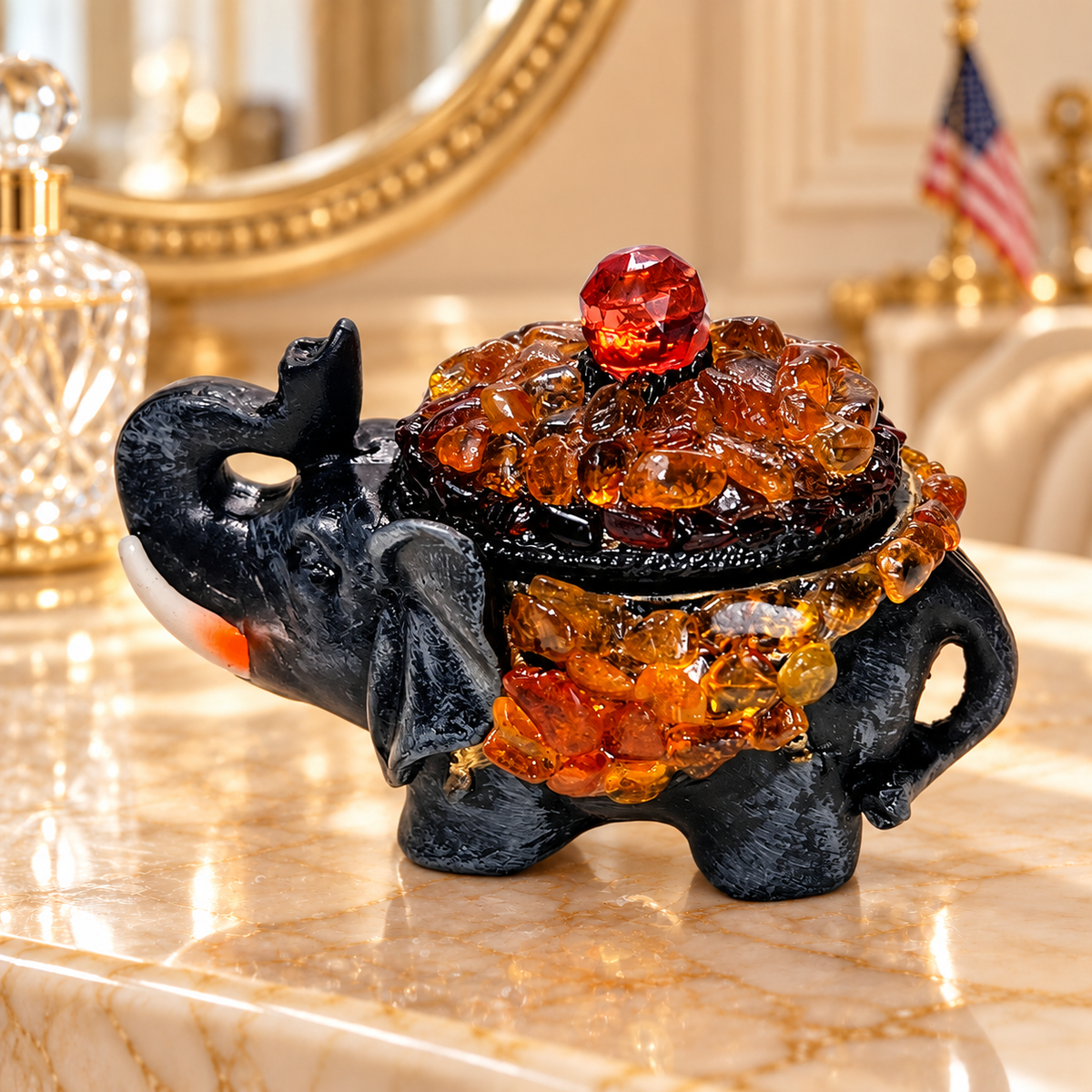 KIZIMA Baltic amber elephant jewelry box on an ivory marble boudoir vanity