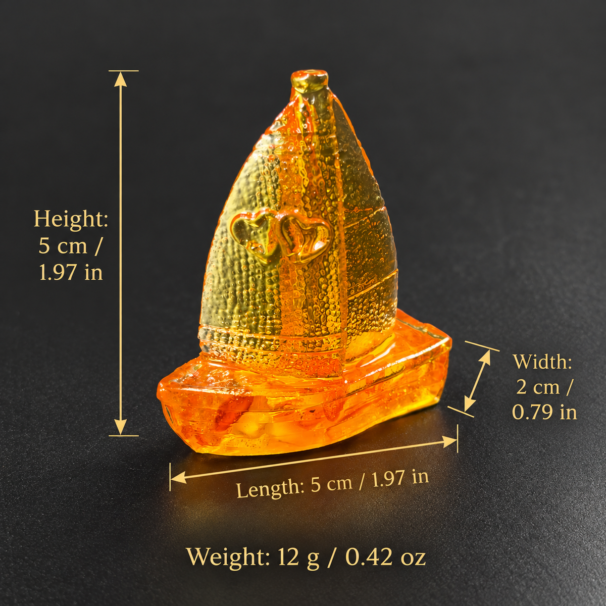 Miniature amber sailboat dimensions: height 5 cm, length 5 cm, width 2 cm and weight 12 g, with inches and ounces.