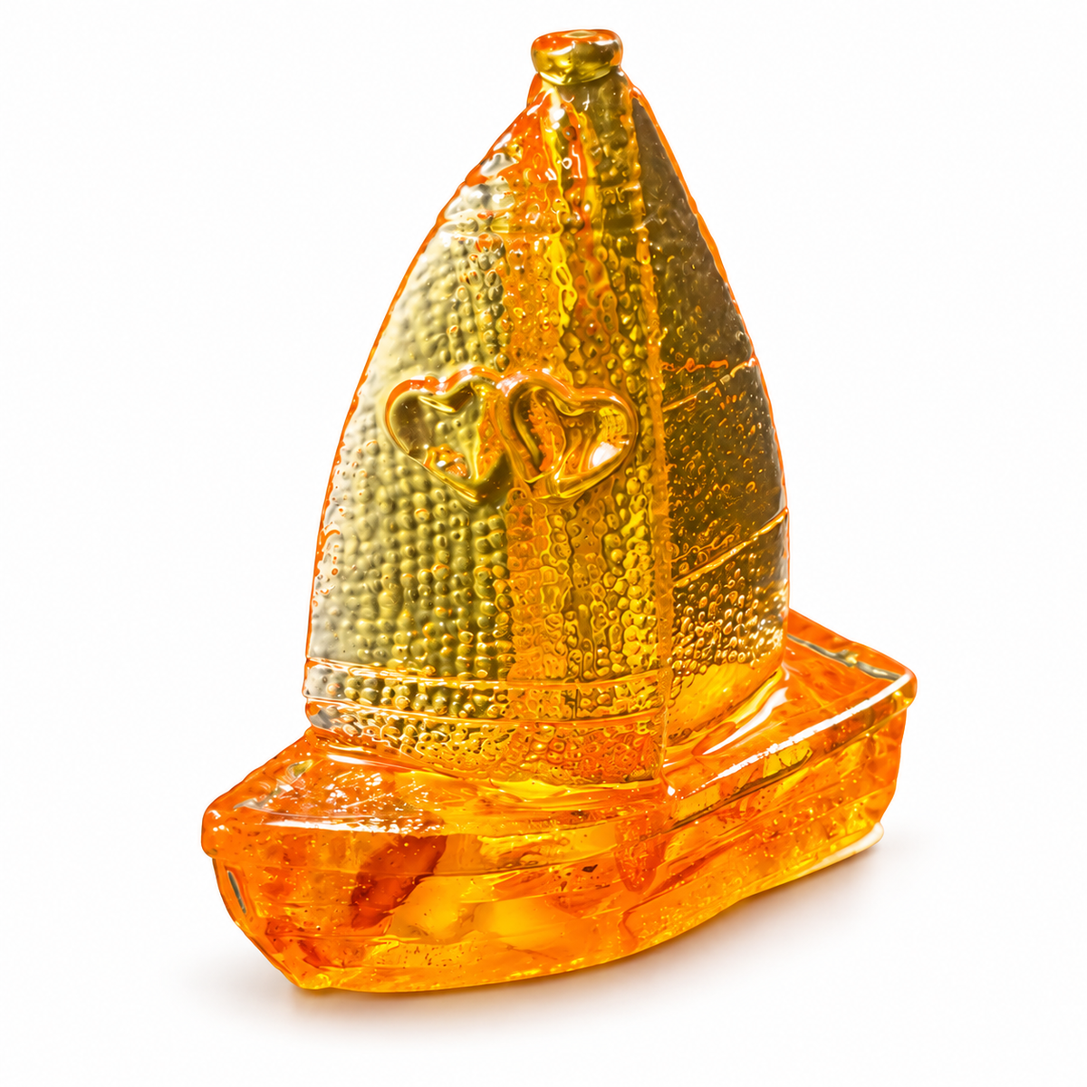 Honey-colored sailboat figurine with twin heart details and an orange amber hull isolated on pure white.